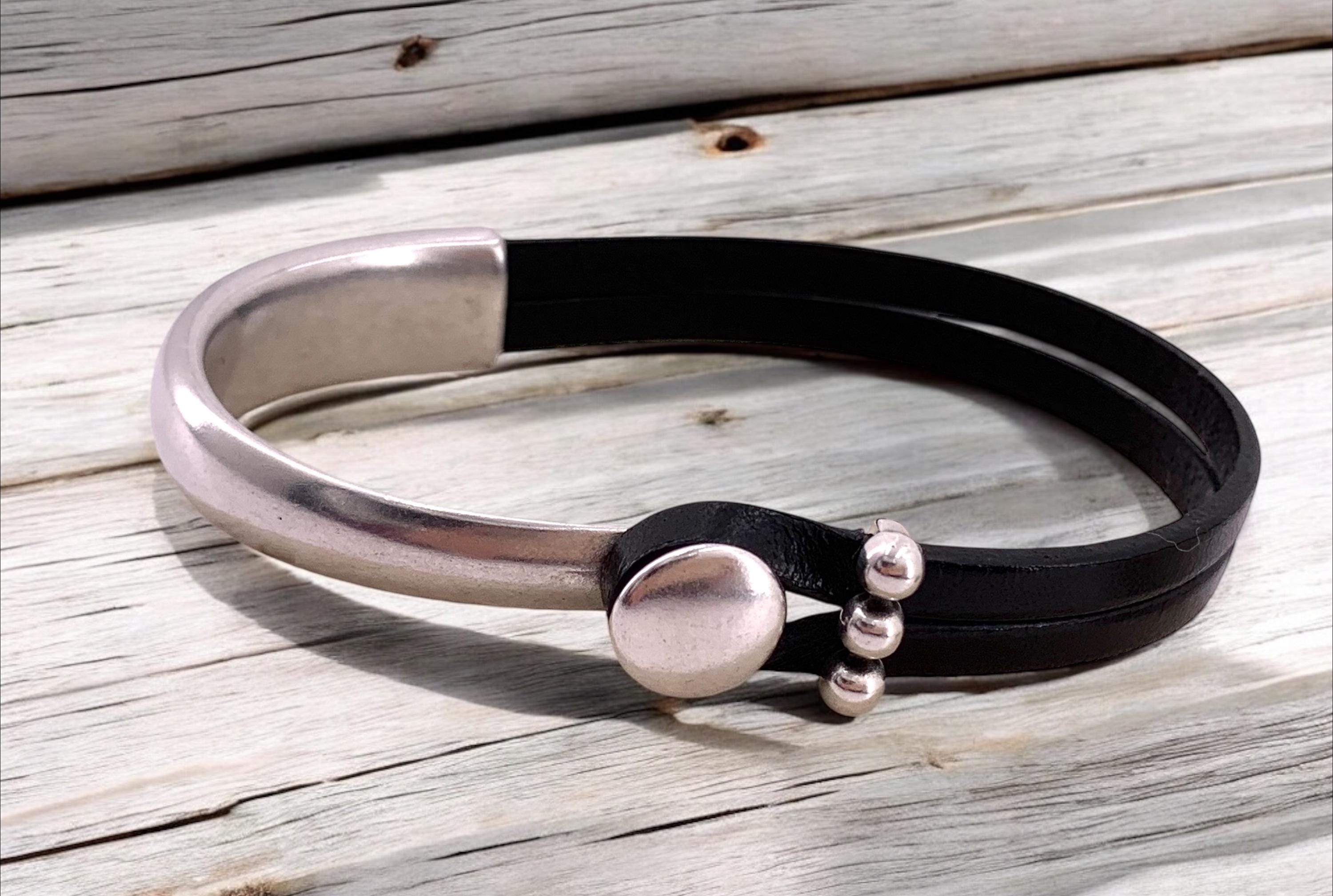 Handmade unisex leather and silver póster half cuff bracelet, custom urban jewelry