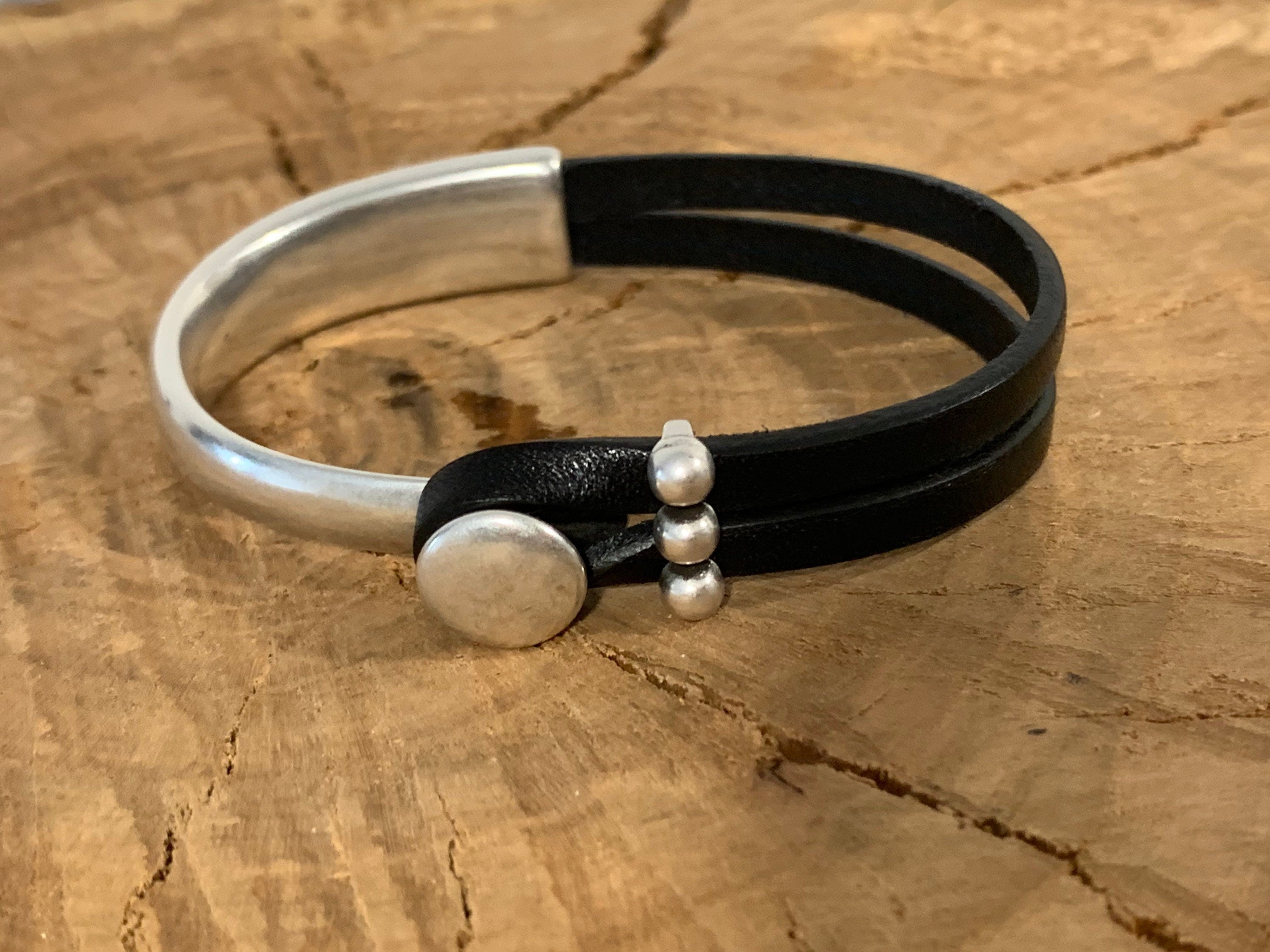 Handmade unisex leather and silver póster half cuff bracelet, custom urban jewelry