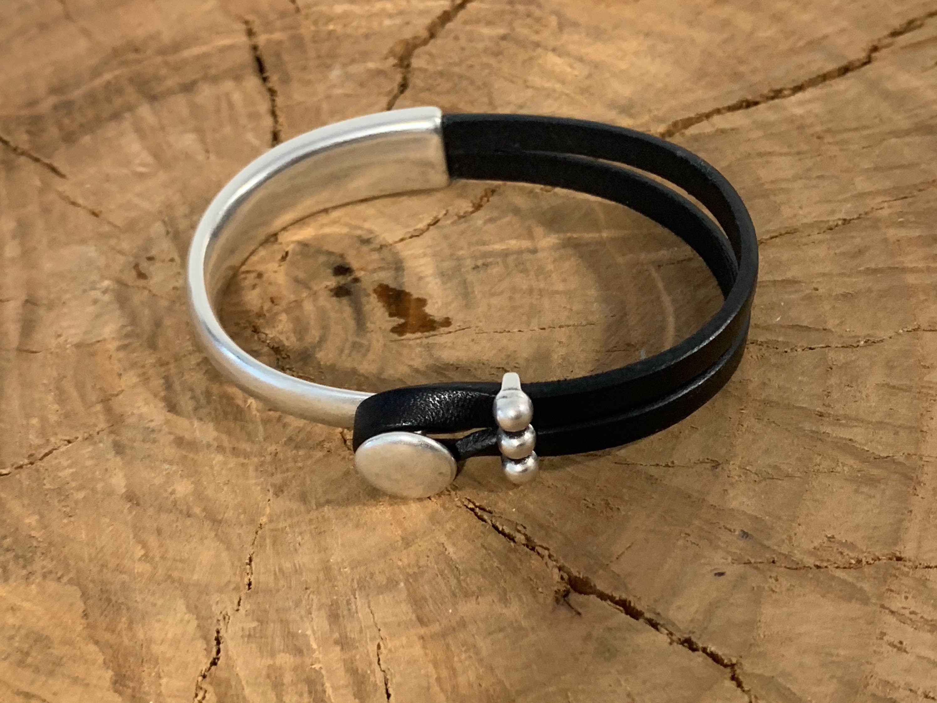 Handmade unisex leather and silver póster half cuff bracelet, custom urban jewelry