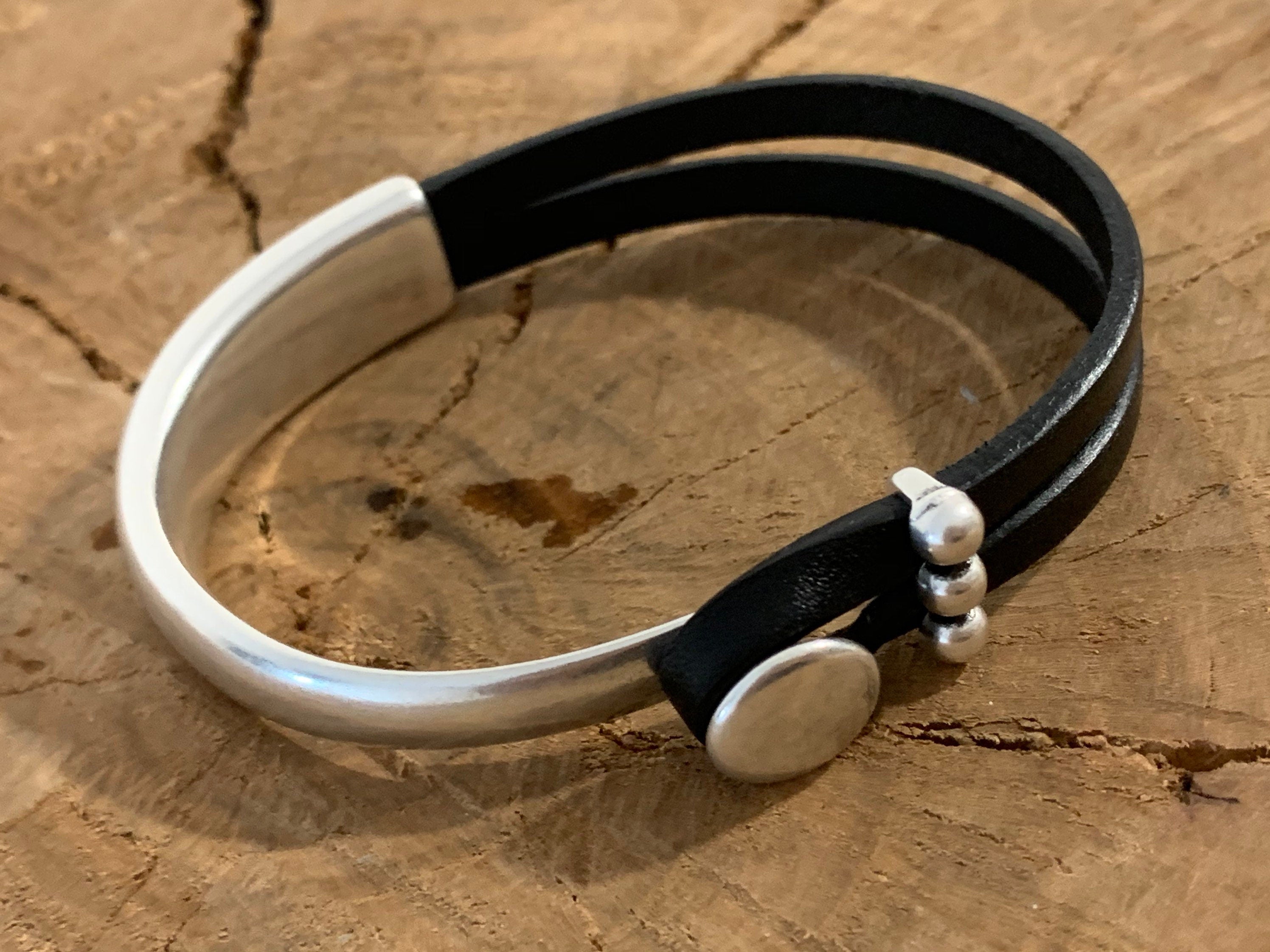 Handmade unisex leather and silver póster half cuff bracelet, custom urban jewelry