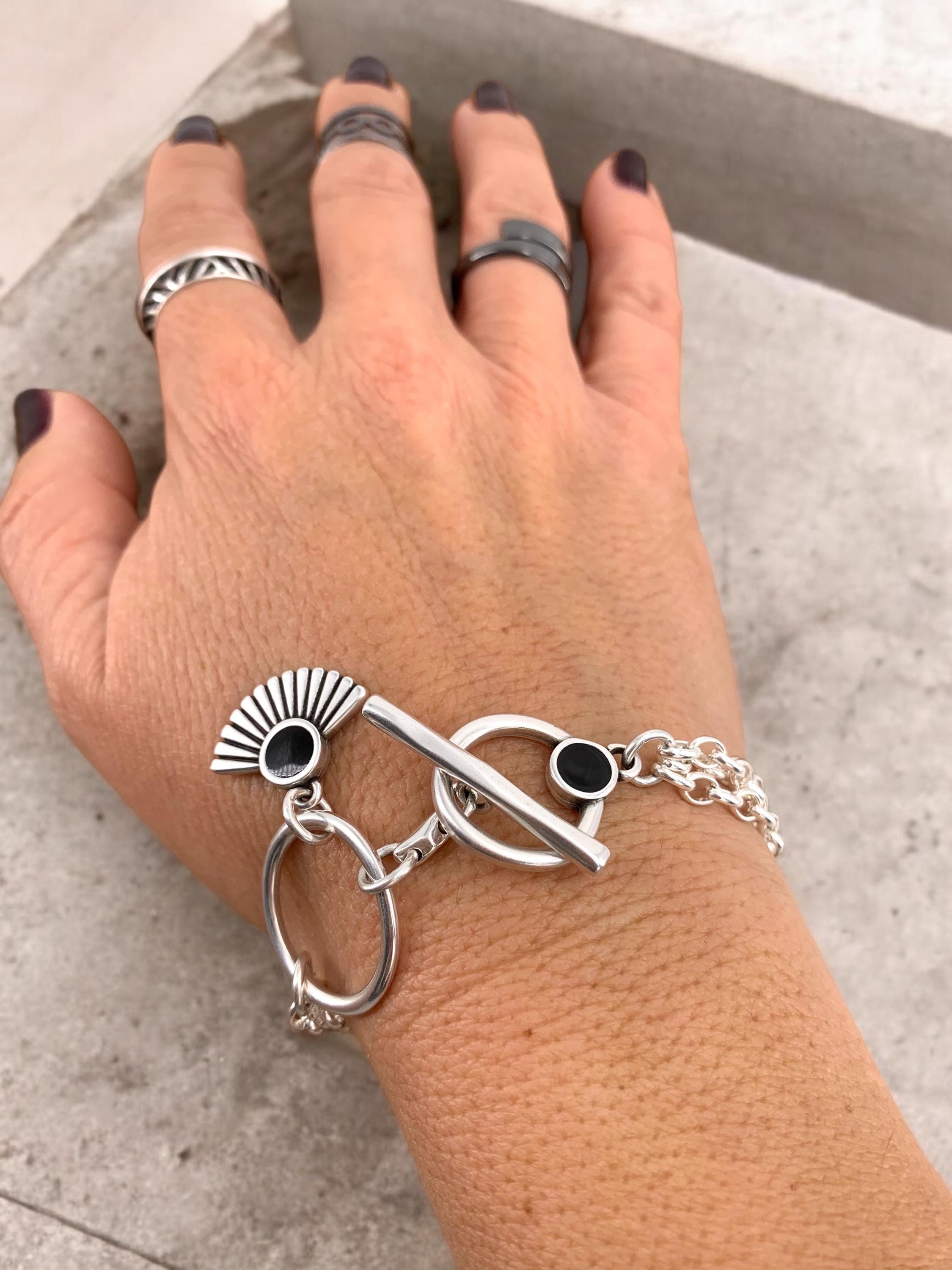 Multi strand silver chain bracelet with toggle clasp and tribal charms, custom handmade jewelry