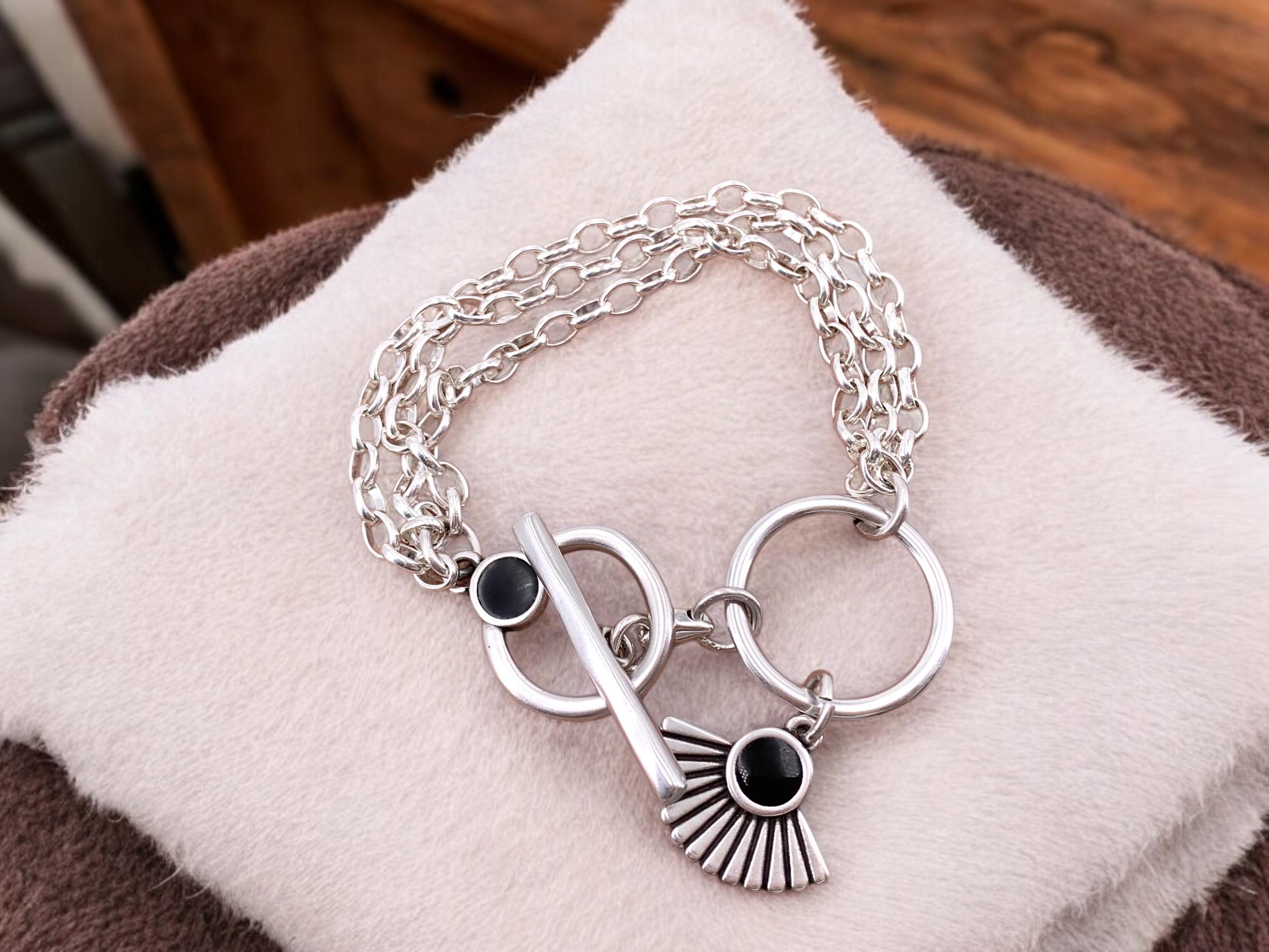 Multi strand silver chain bracelet with toggle clasp and tribal charms, custom handmade jewelry