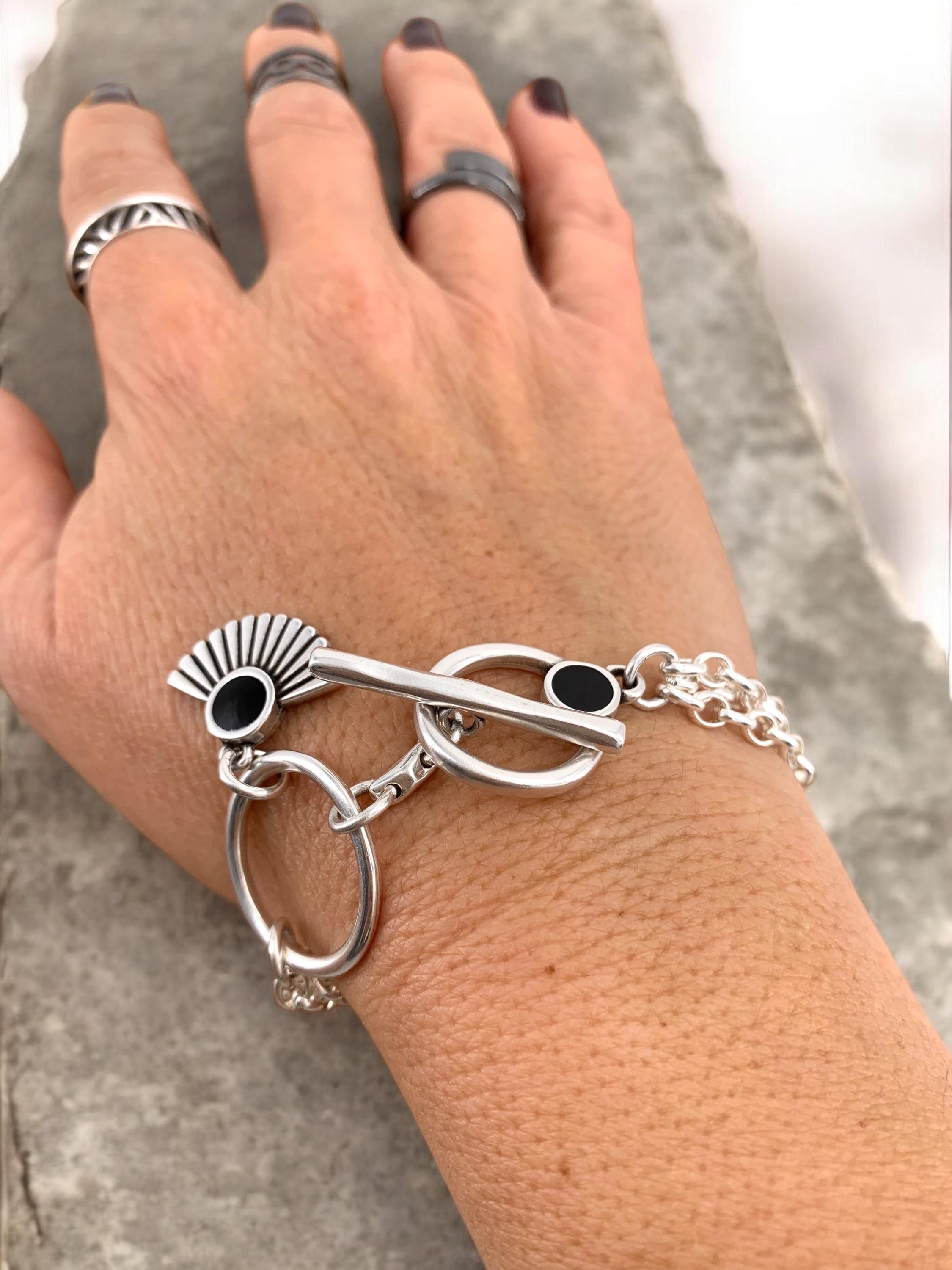 Multi strand silver chain bracelet with toggle clasp and tribal charms, custom handmade jewelry