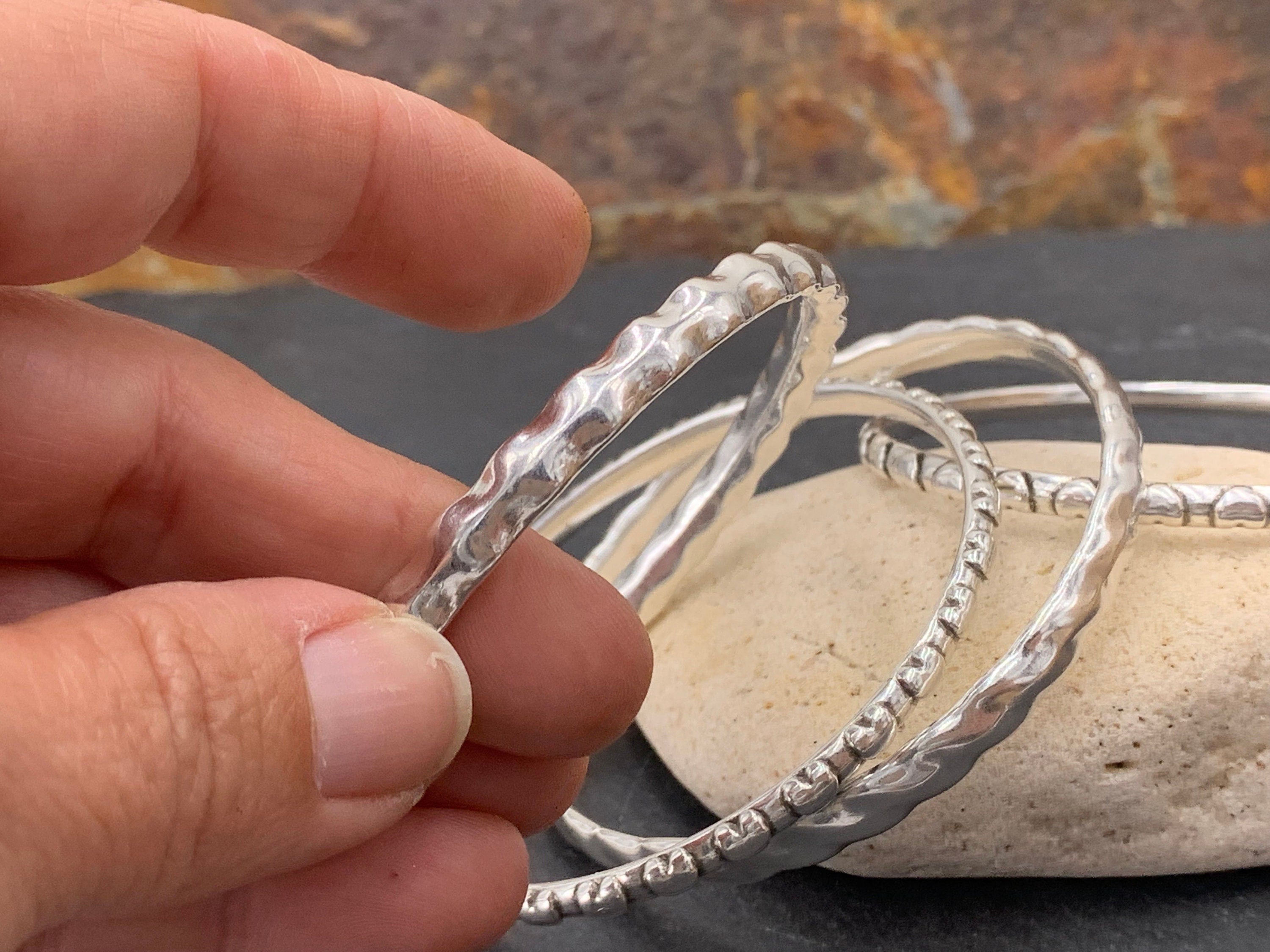 Set of 4 bangle bracelets. Silver bangle bracelet, rigid silver bracelet, hammered bracelet, engraved bangle, gift for women, cuff bracelet