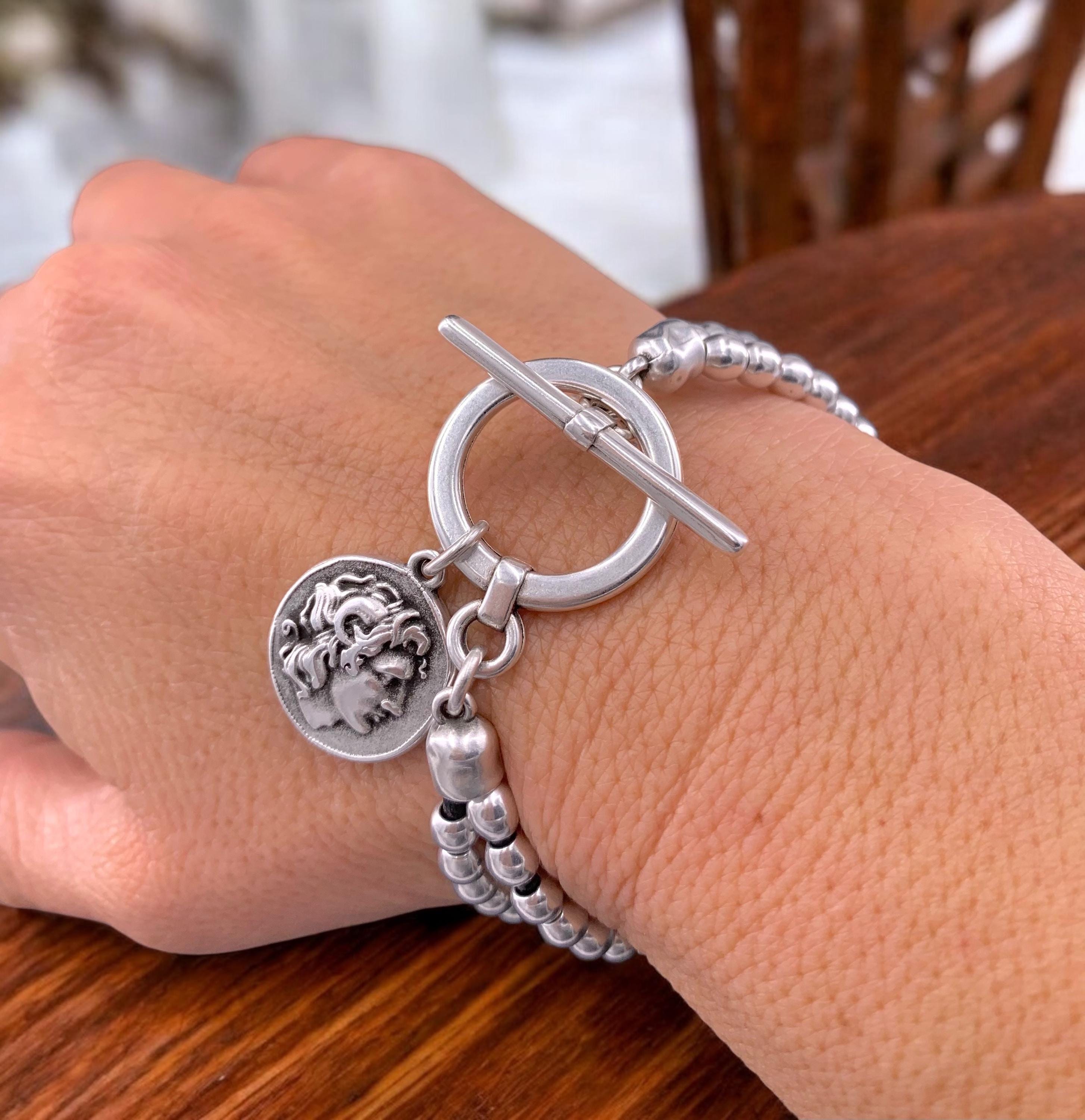 Chunky silver beaded bracelet with toggle clasp and Greek coin pendant, bold handmade jewelry