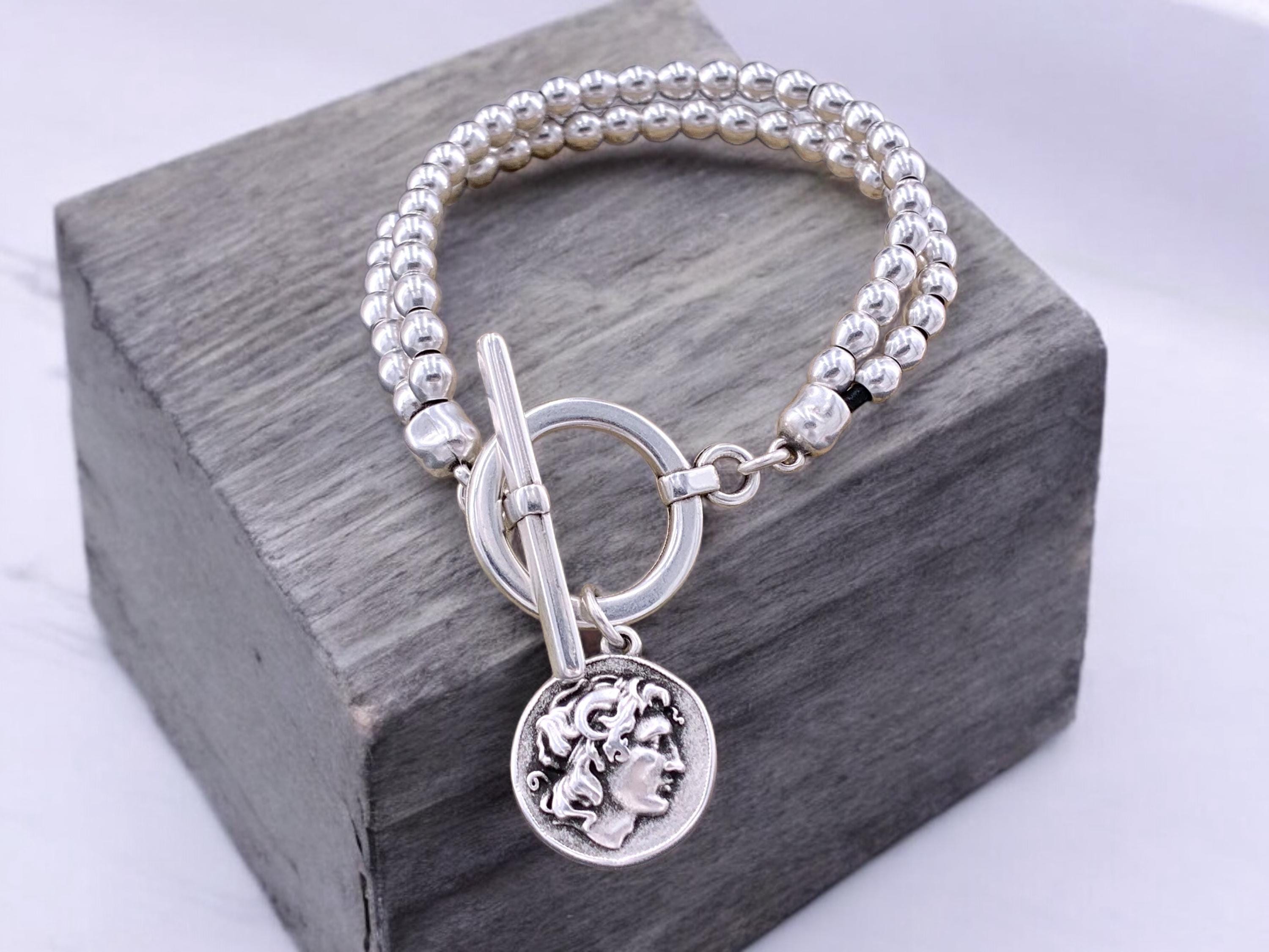 Chunky silver beaded bracelet with toggle clasp and Greek coin pendant, bold handmade jewelry