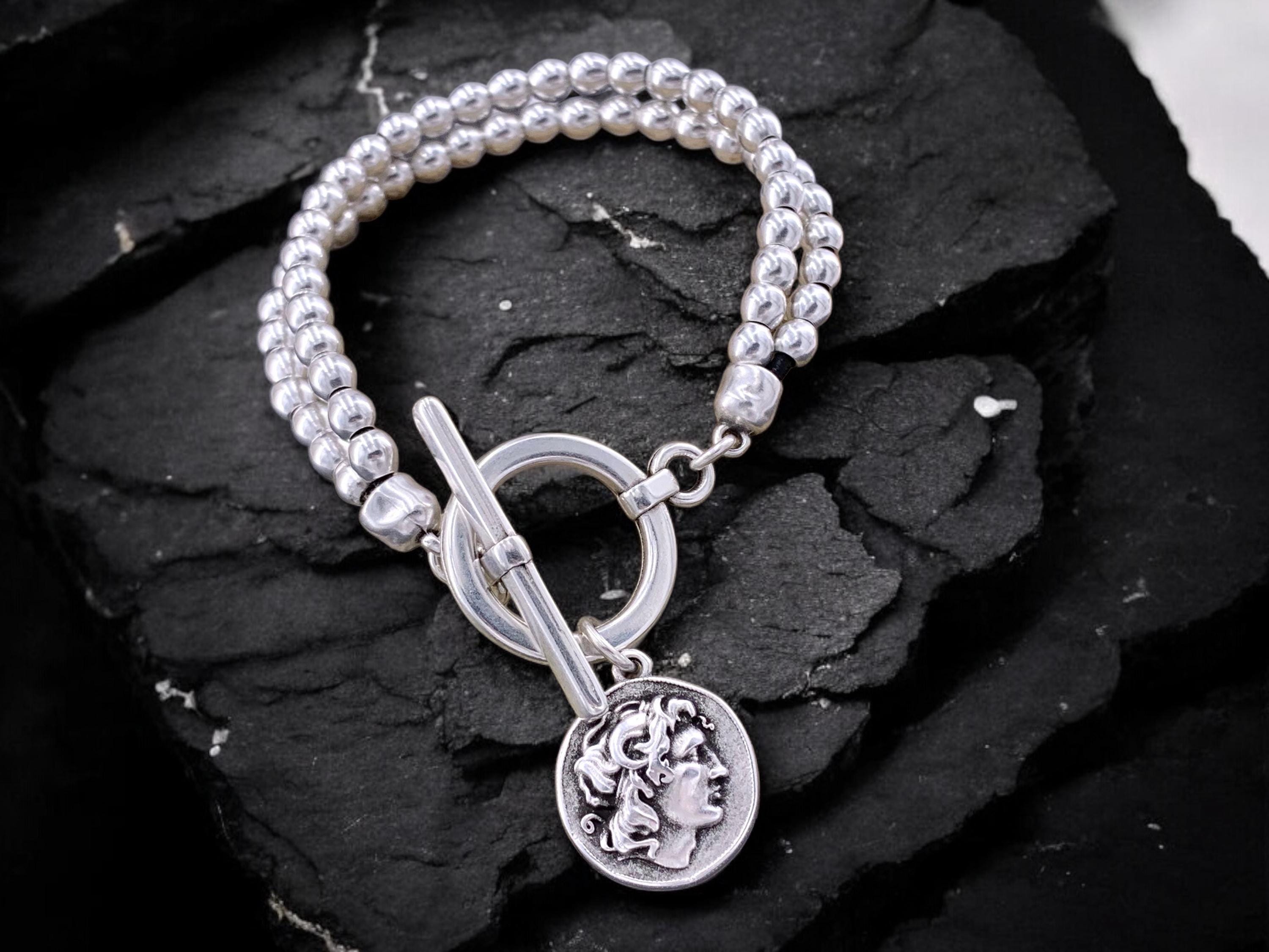Chunky silver beaded bracelet with toggle clasp and Greek coin pendant, bold handmade jewelry