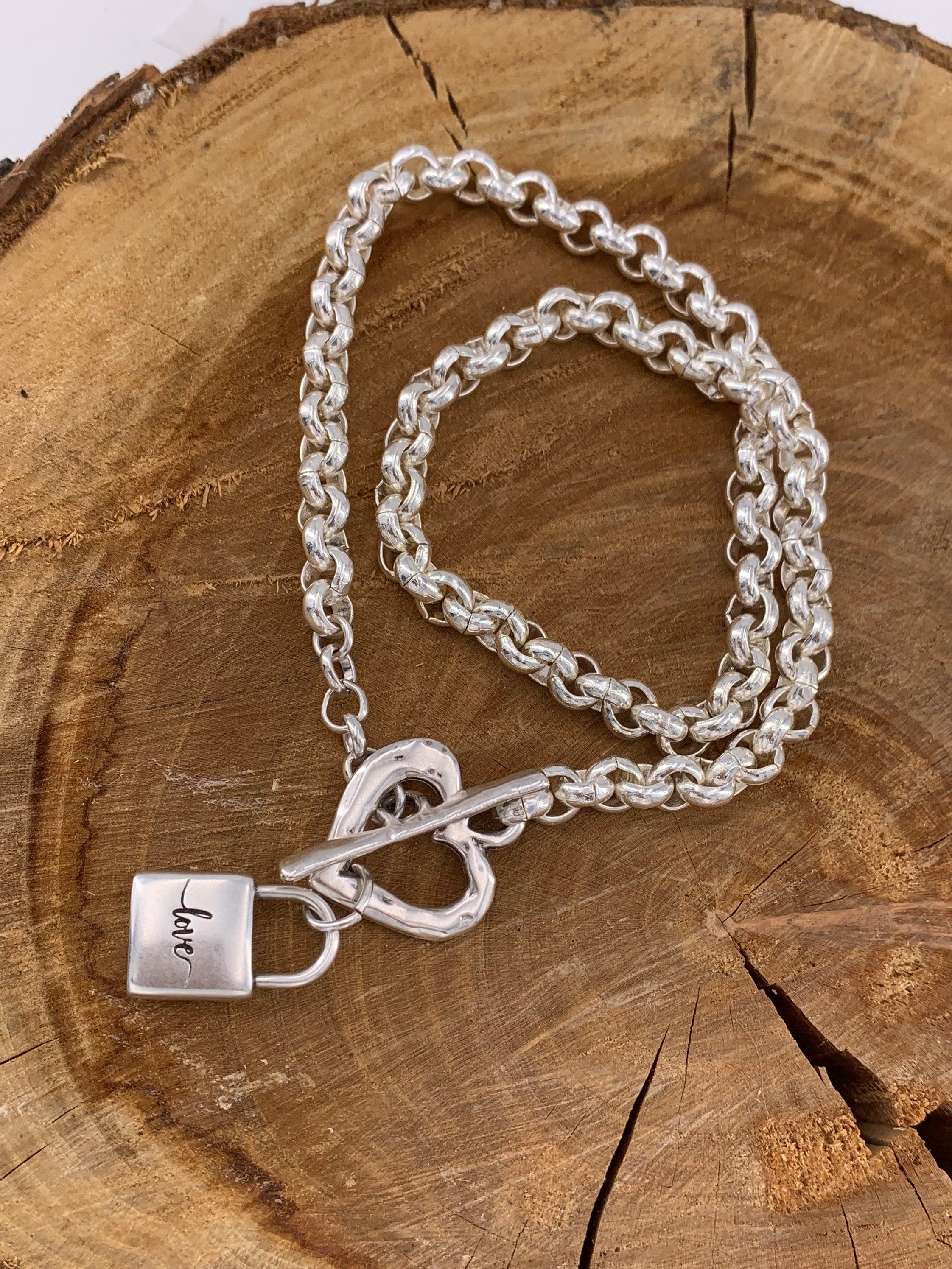 Thick chain silver necklace with a heart-shaped toggle clasp and a padlock-shaped pendant, uno de 50 style silver chunky necklace,