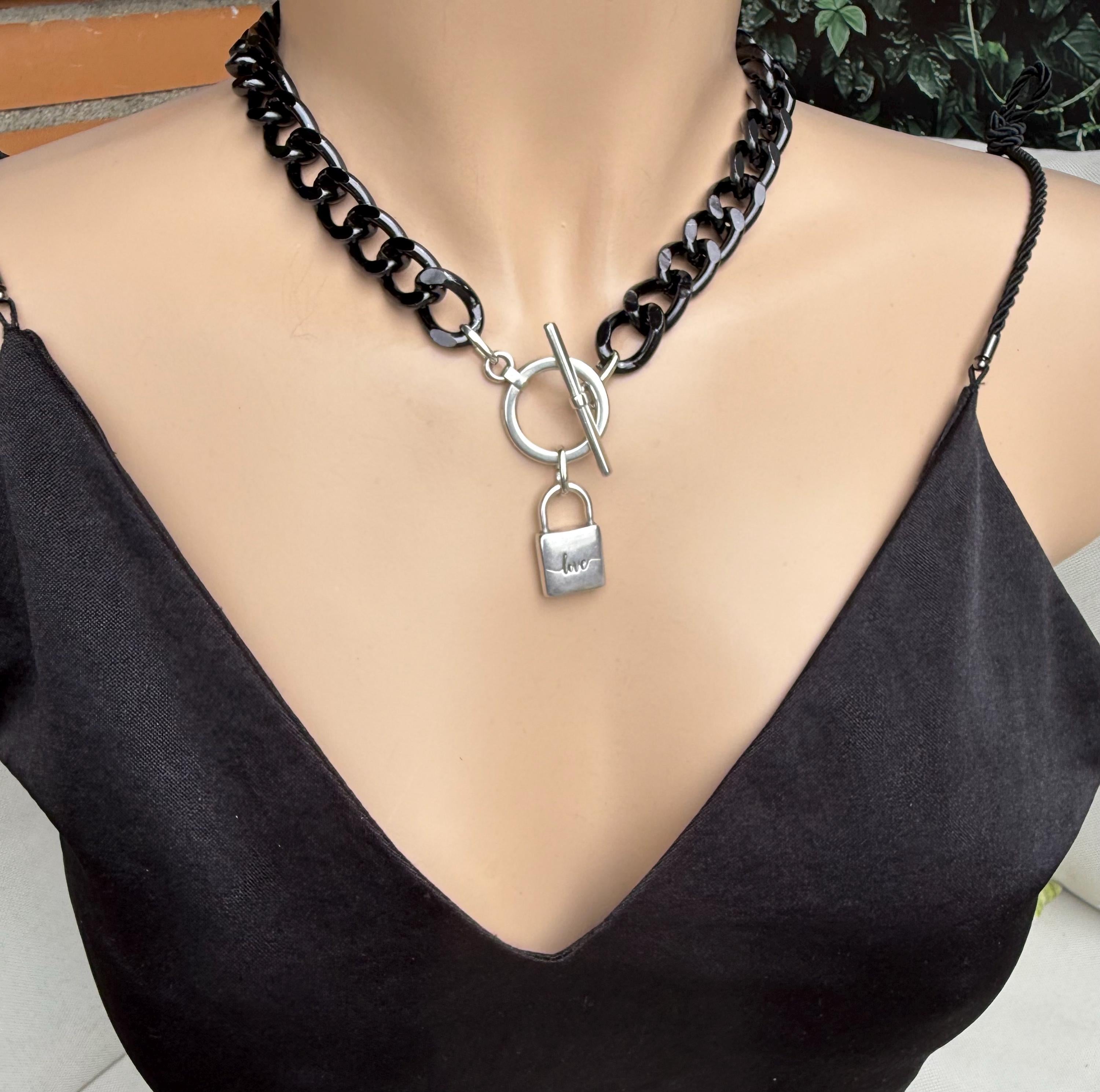 Chunky aluminum black chain necklace with silver toggle clasp and “love” padlock pendant