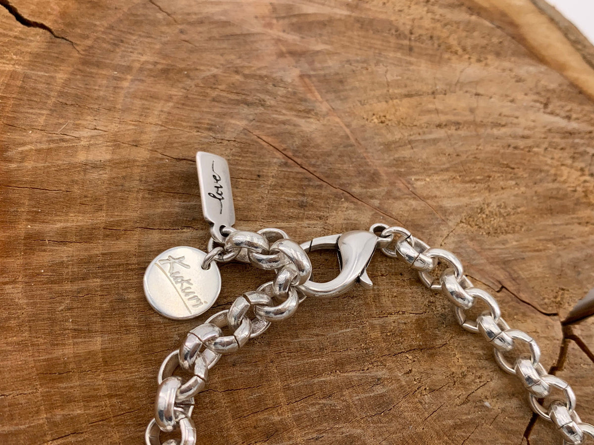 chunky silver chain bracelet with Swarovsky Crystal central piece, custom bold jewelry