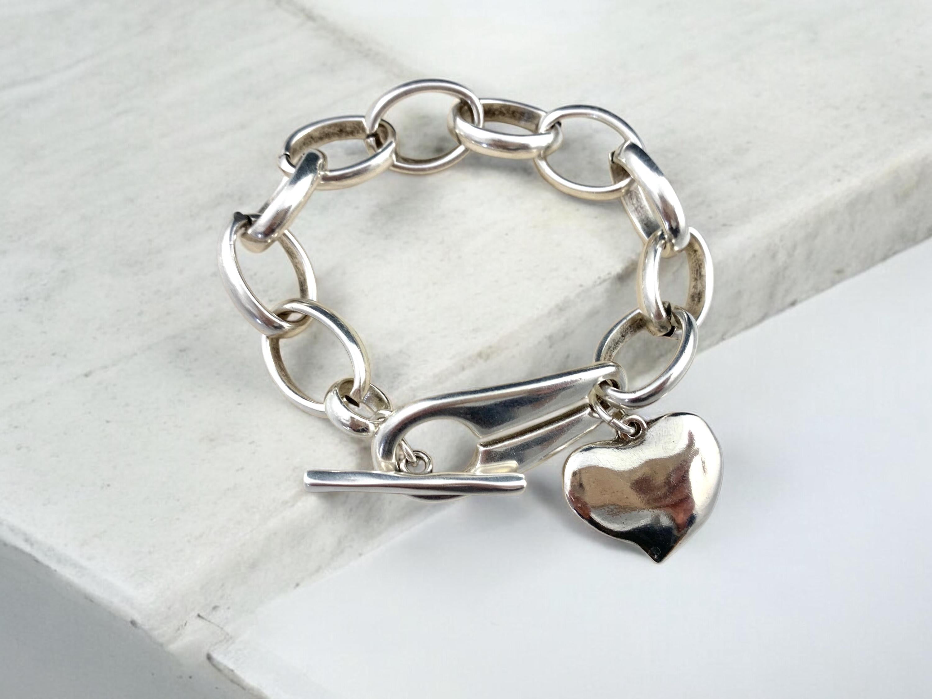 Artisian Chunky silver plated bracelet with toggle bracelet and heart pendant charm