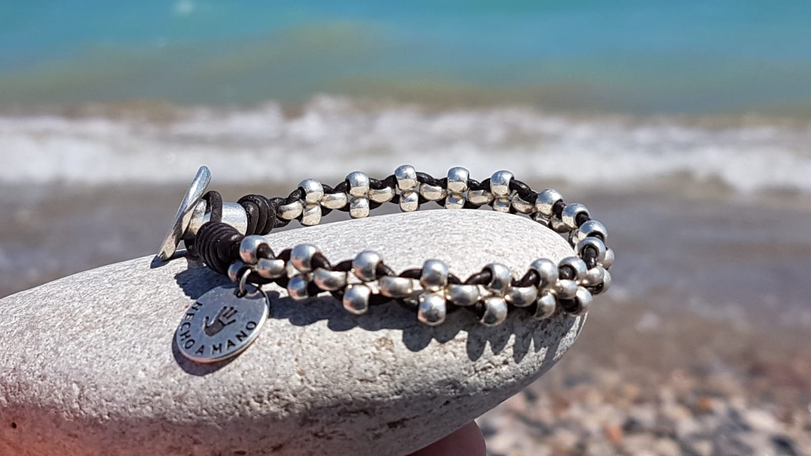 Artisan Bohemian silver leather braided beaded bracelet, tribal hippie handmade jewelry.