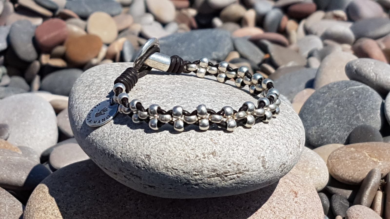 Artisan Bohemian silver leather braided beaded bracelet, tribal hippie handmade jewelry.