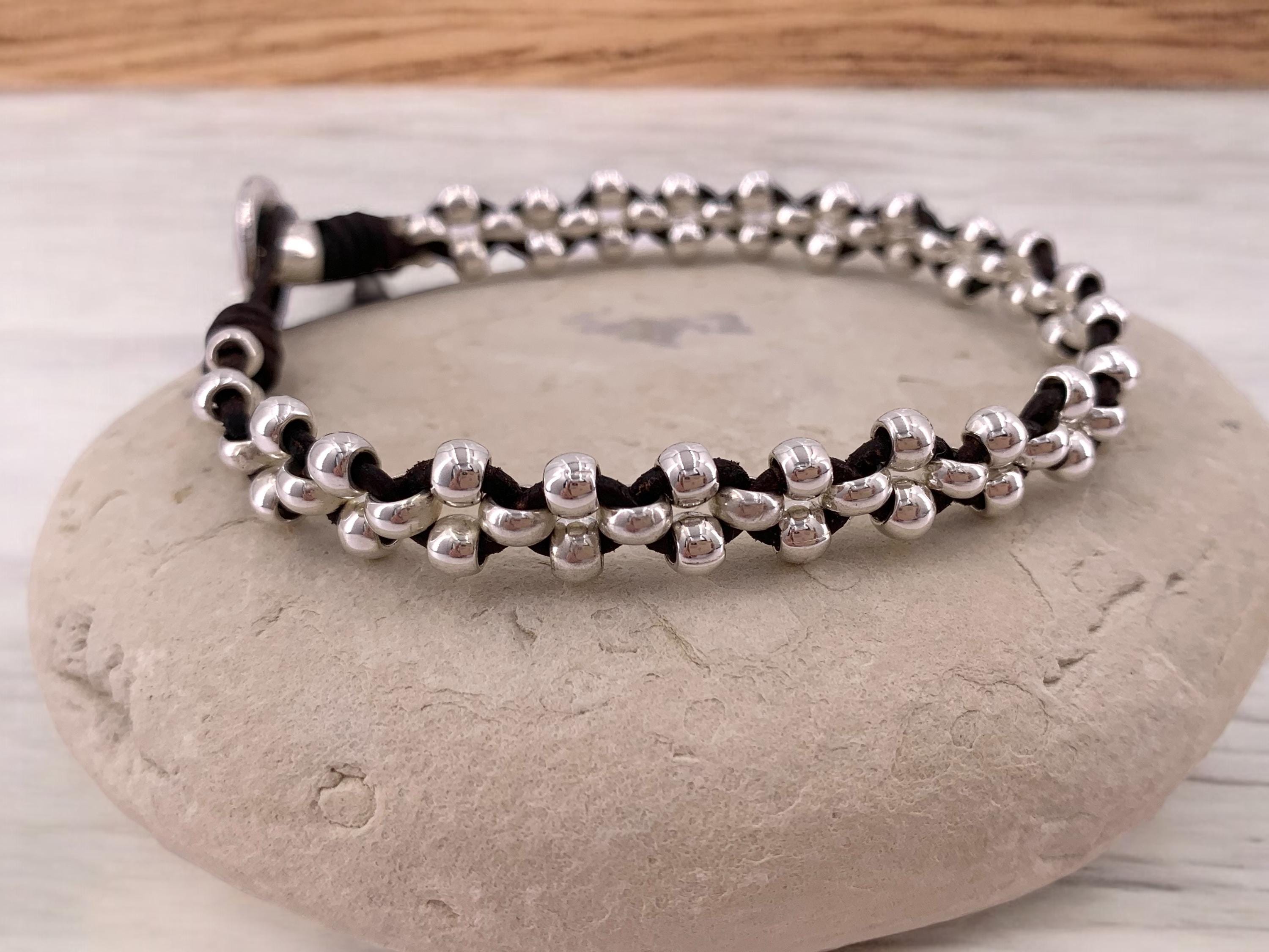 Artisan Bohemian silver leather braided beaded bracelet, tribal hippie handmade jewelry.
