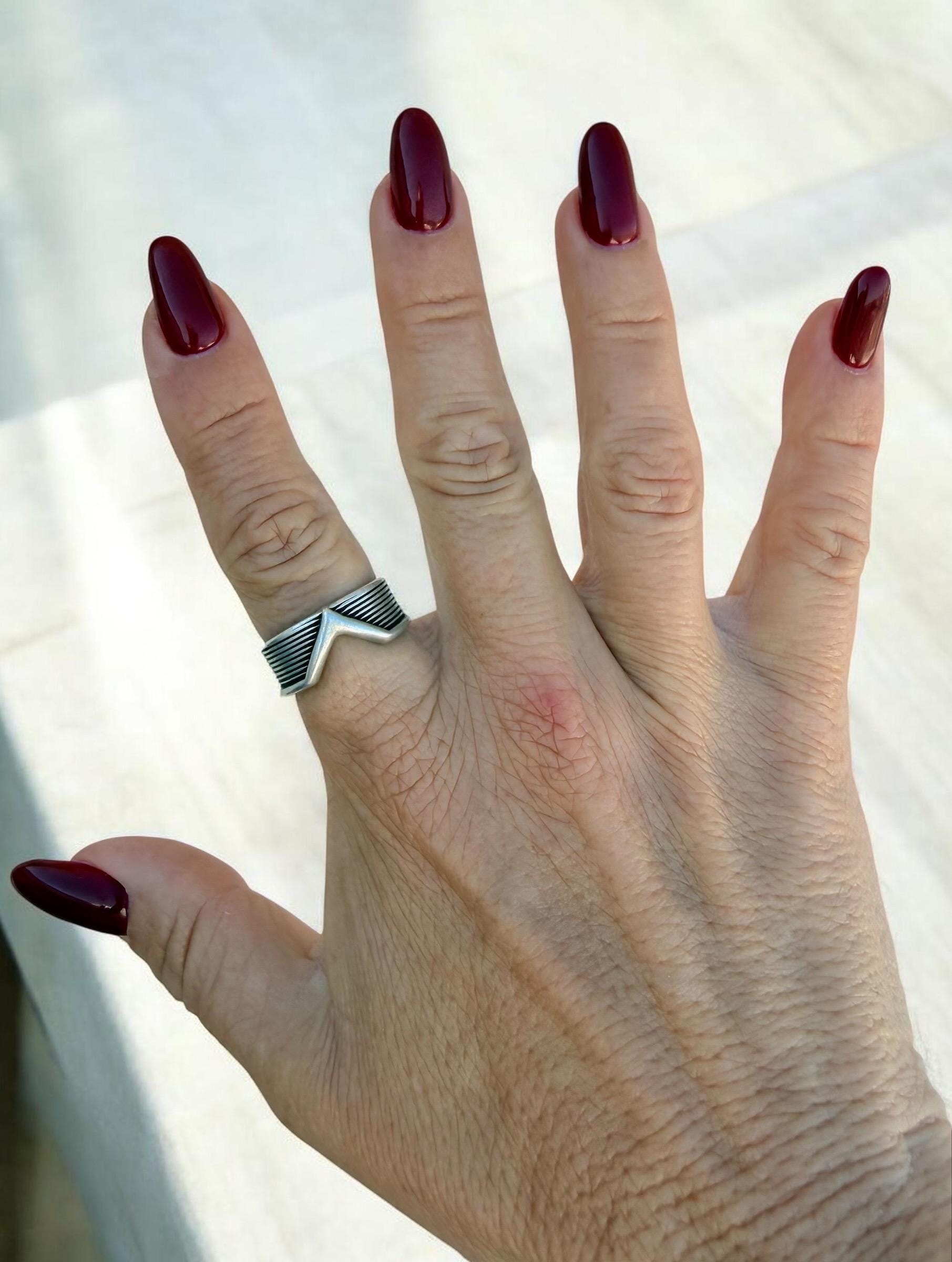Silver unisex rock-style chunky ring engraved and open band