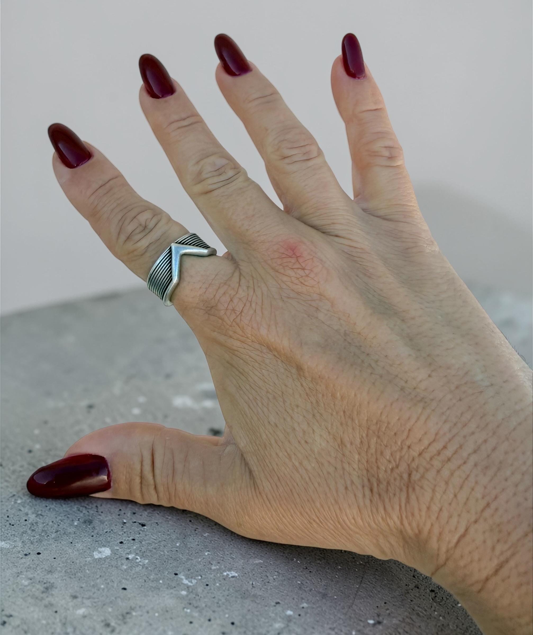 Silver unisex rock-style chunky ring engraved and open band