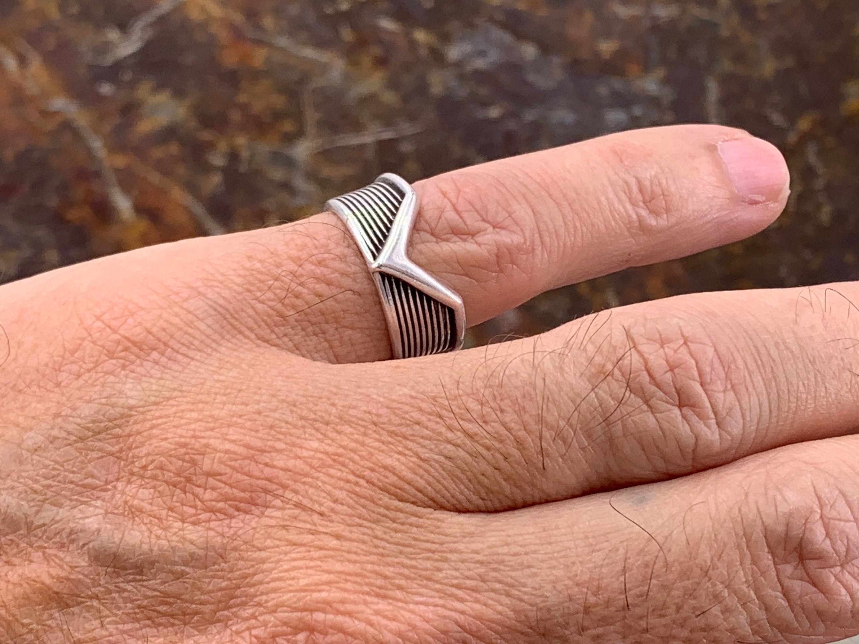 Silver unisex rock-style chunky ring engraved and open band