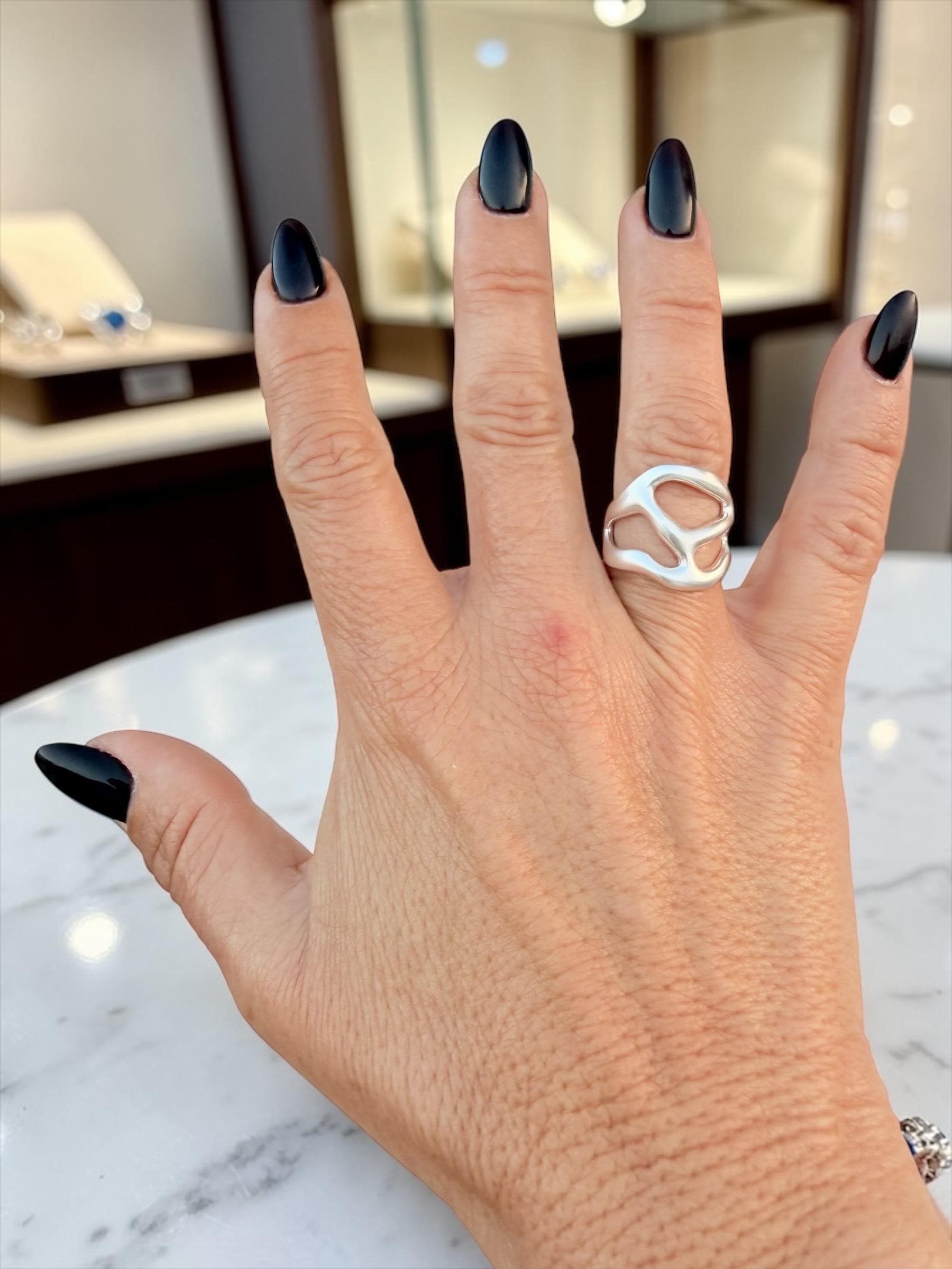 Artisian silver plated carved ring with open band design and bohemian style
