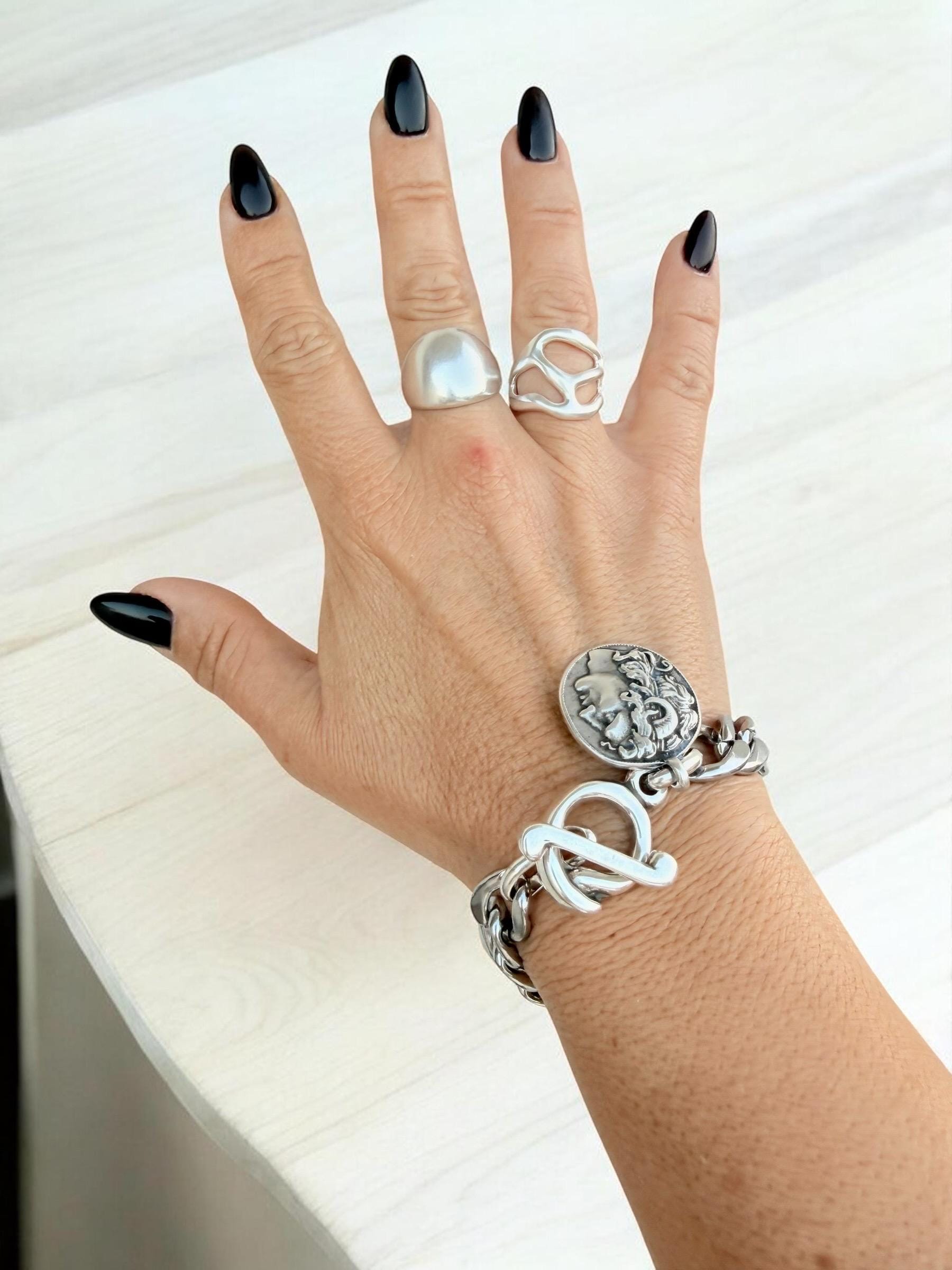 Artisian silver plated carved ring with open band design and bohemian style