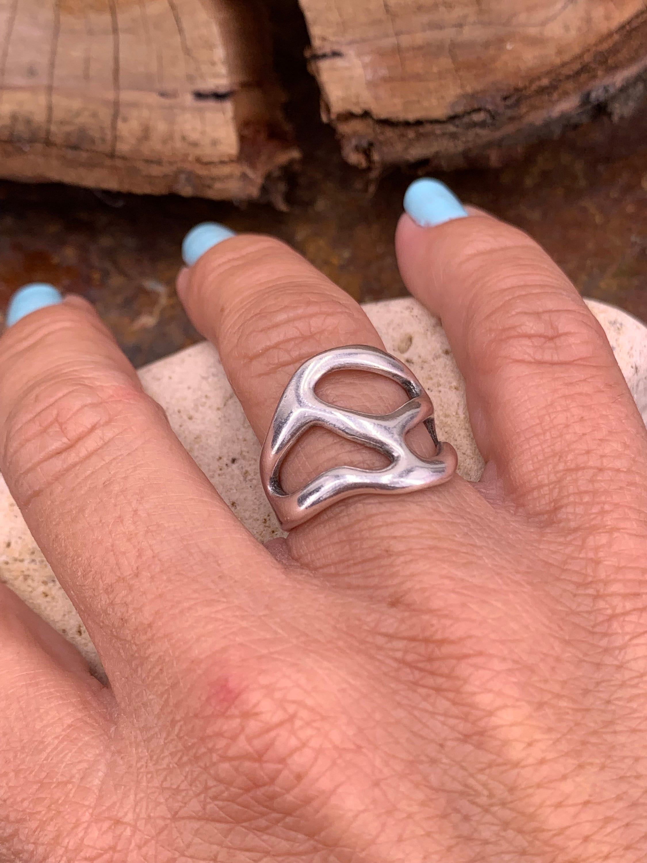 Artisian silver plated carved ring with open band design and bohemian style