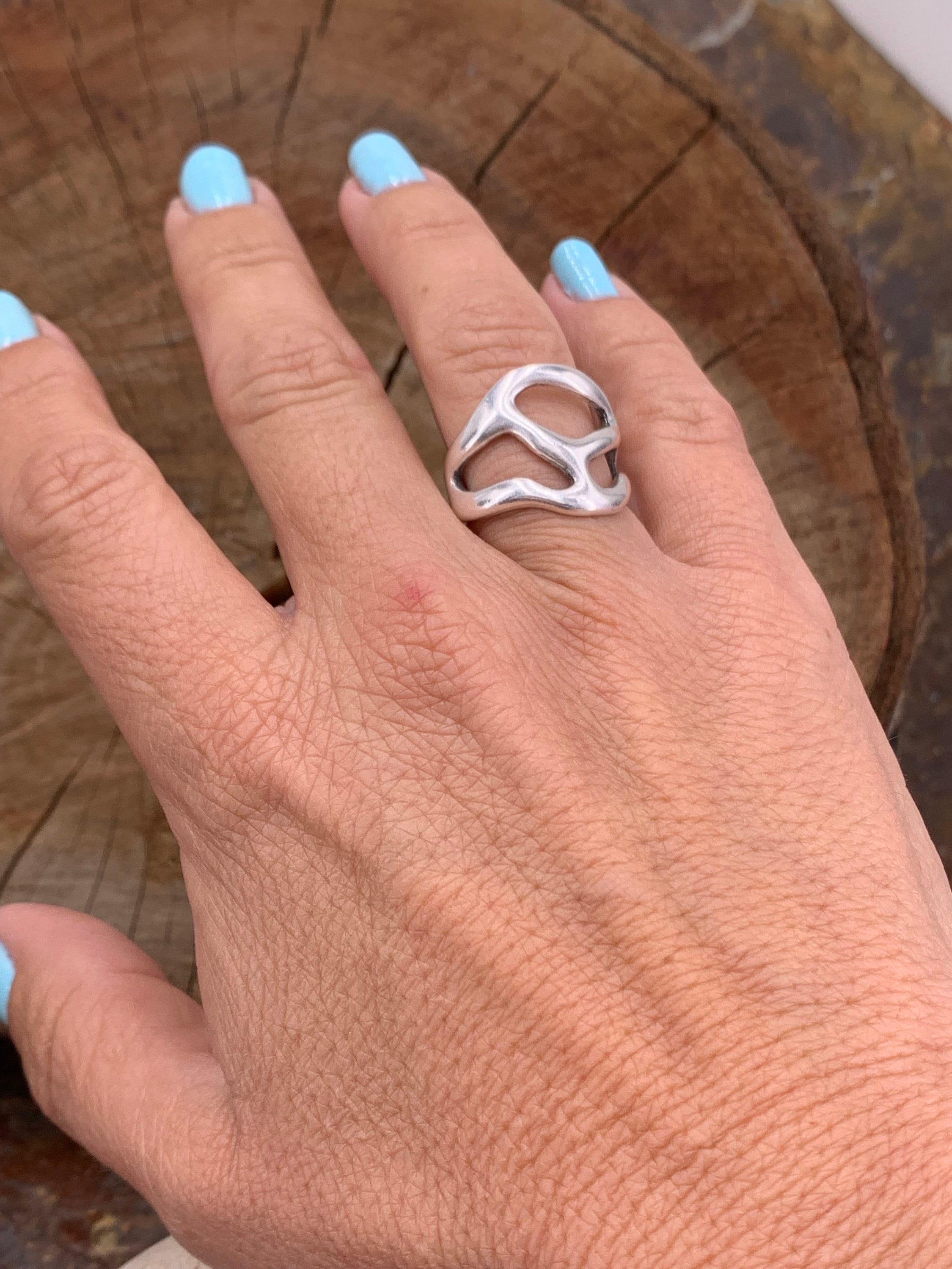 Artisian silver plated carved ring with open band design and bohemian style