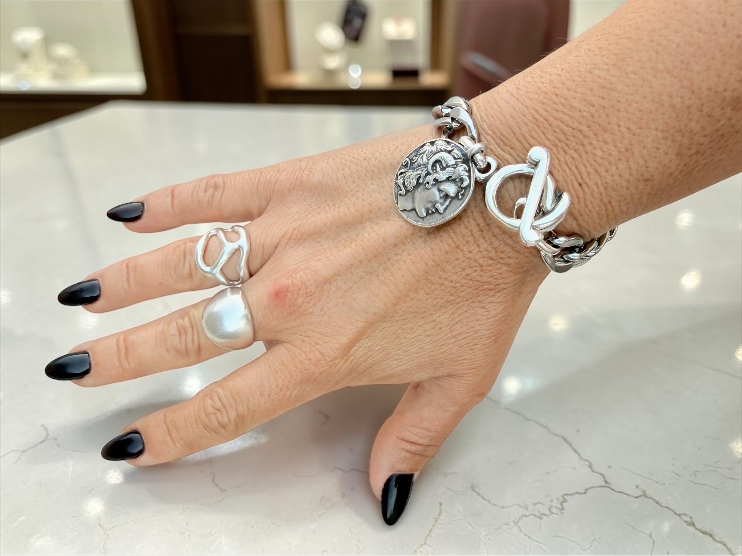 Artisian silver plated carved ring with open band design and bohemian style