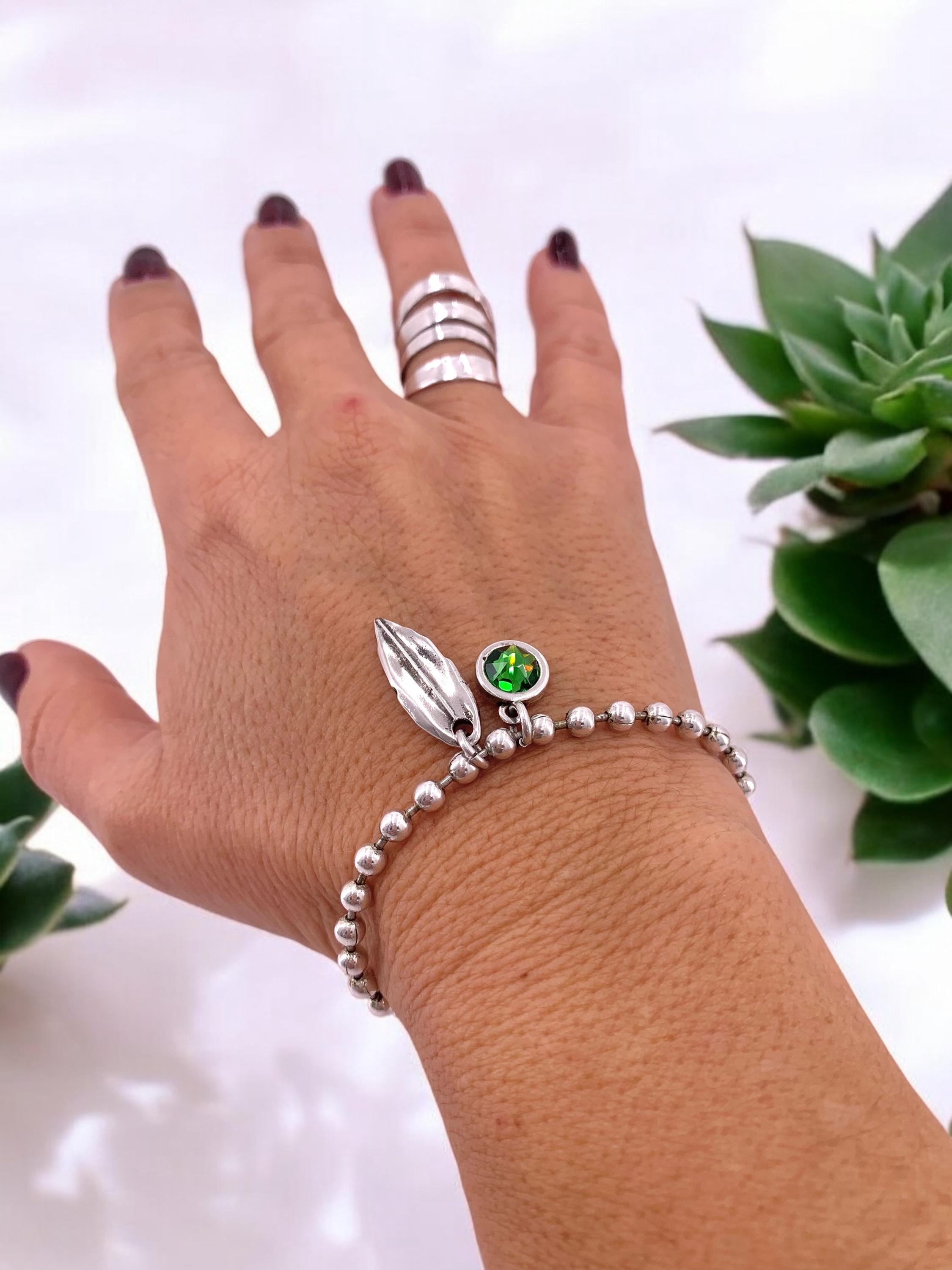 Silver balls chain bracelet with a leaf and Swarovski crystal charm