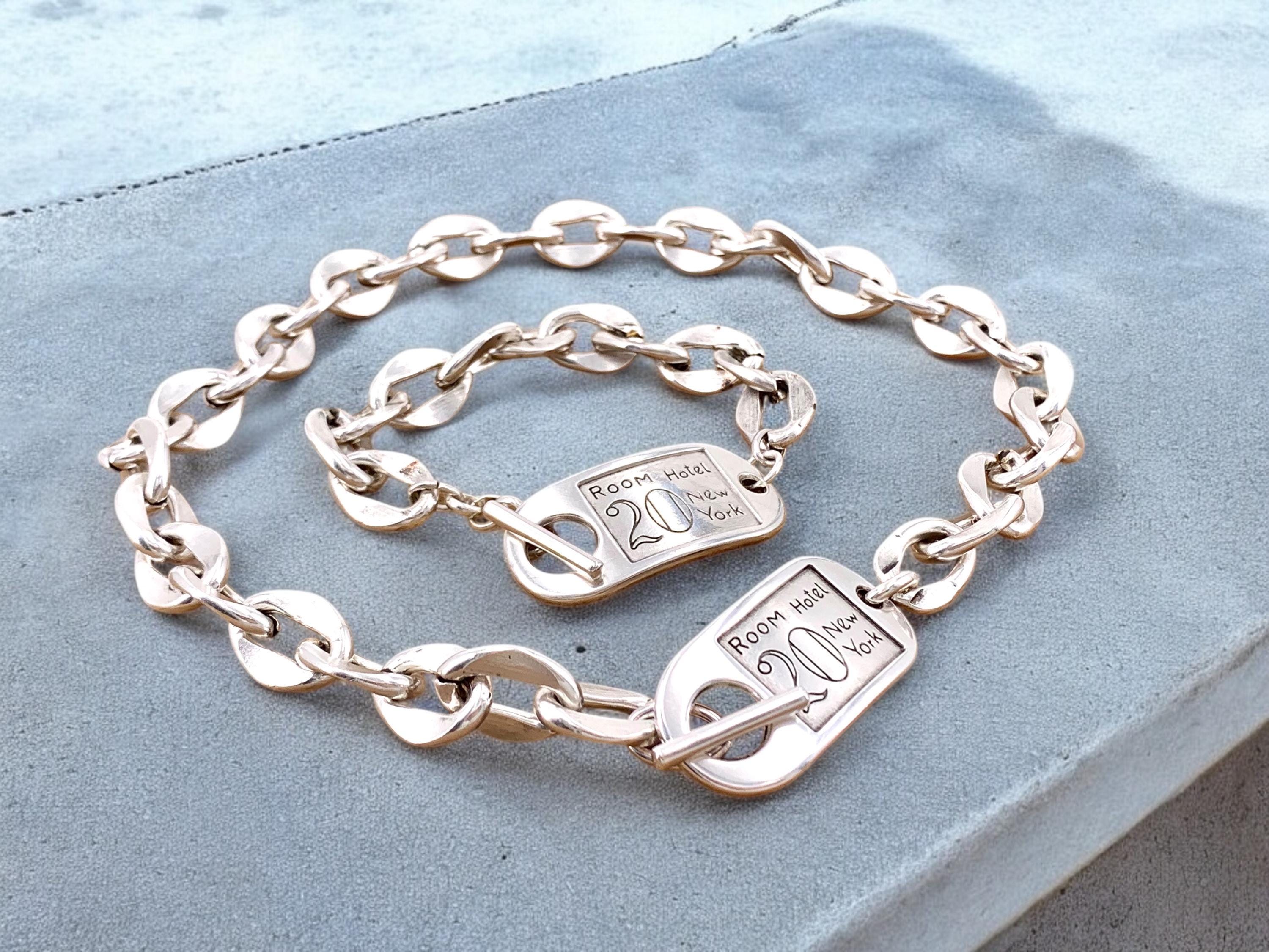 Chunky silver chain necklace with sculpted toggle clasp. Handmade in silver-plated steel. Industrial jewelry