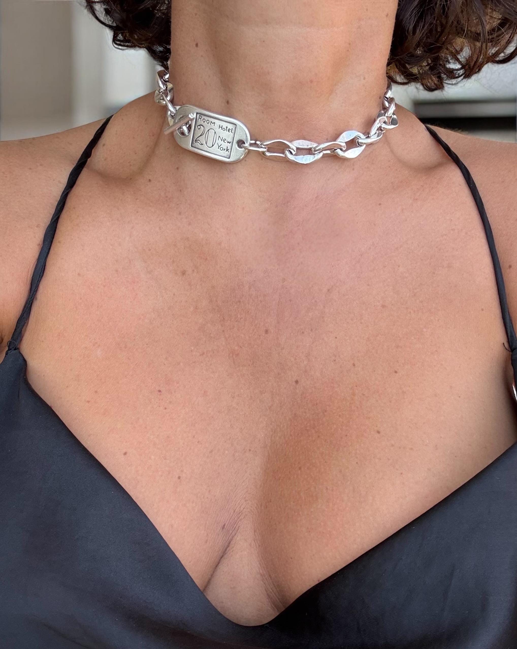 Chunky silver chain necklace with sculpted toggle clasp. Handmade in silver-plated steel. Industrial jewelry
