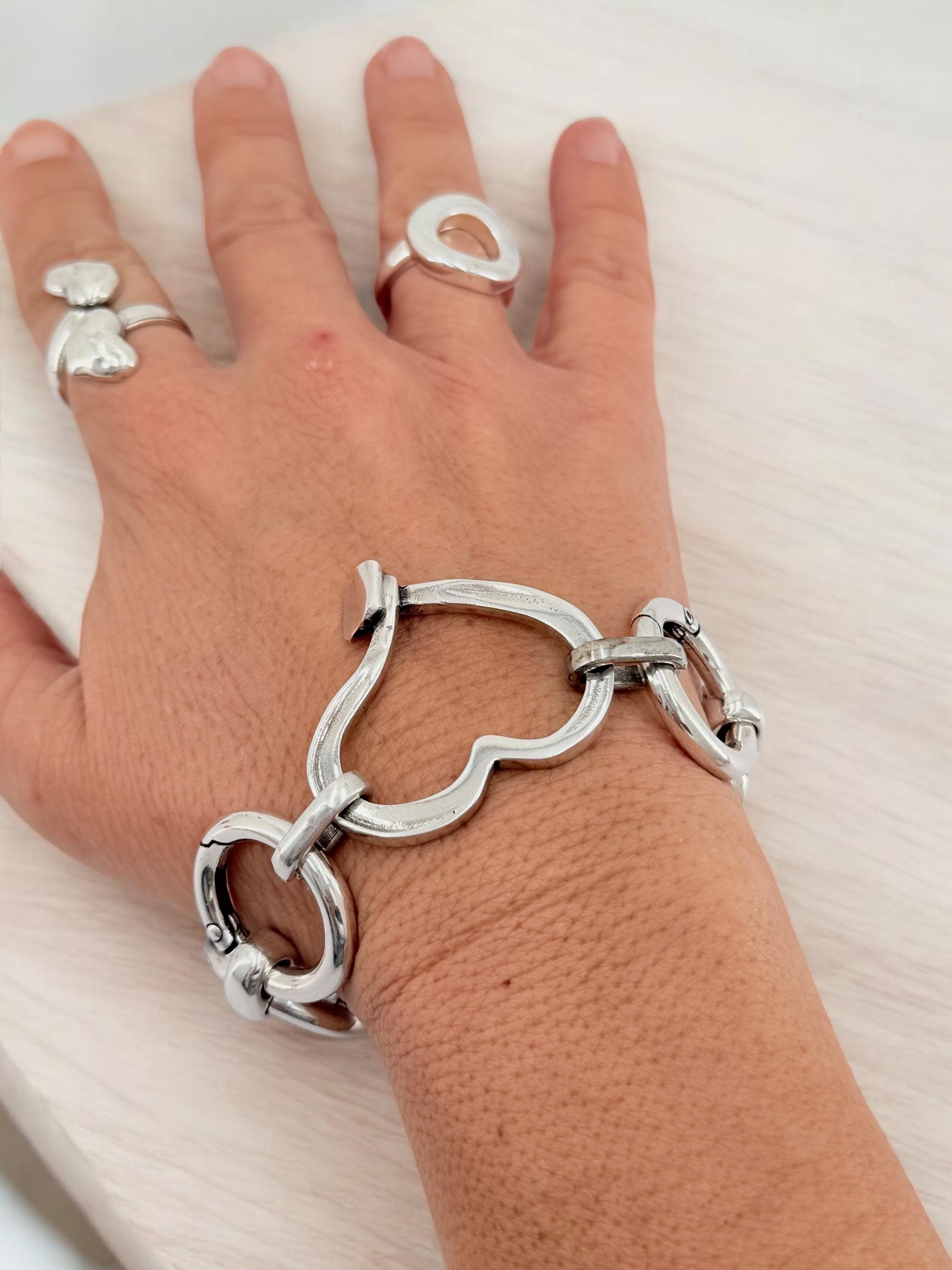 Artisian Circular big links Chunky Silver plated bracelet with statement heart central motive
