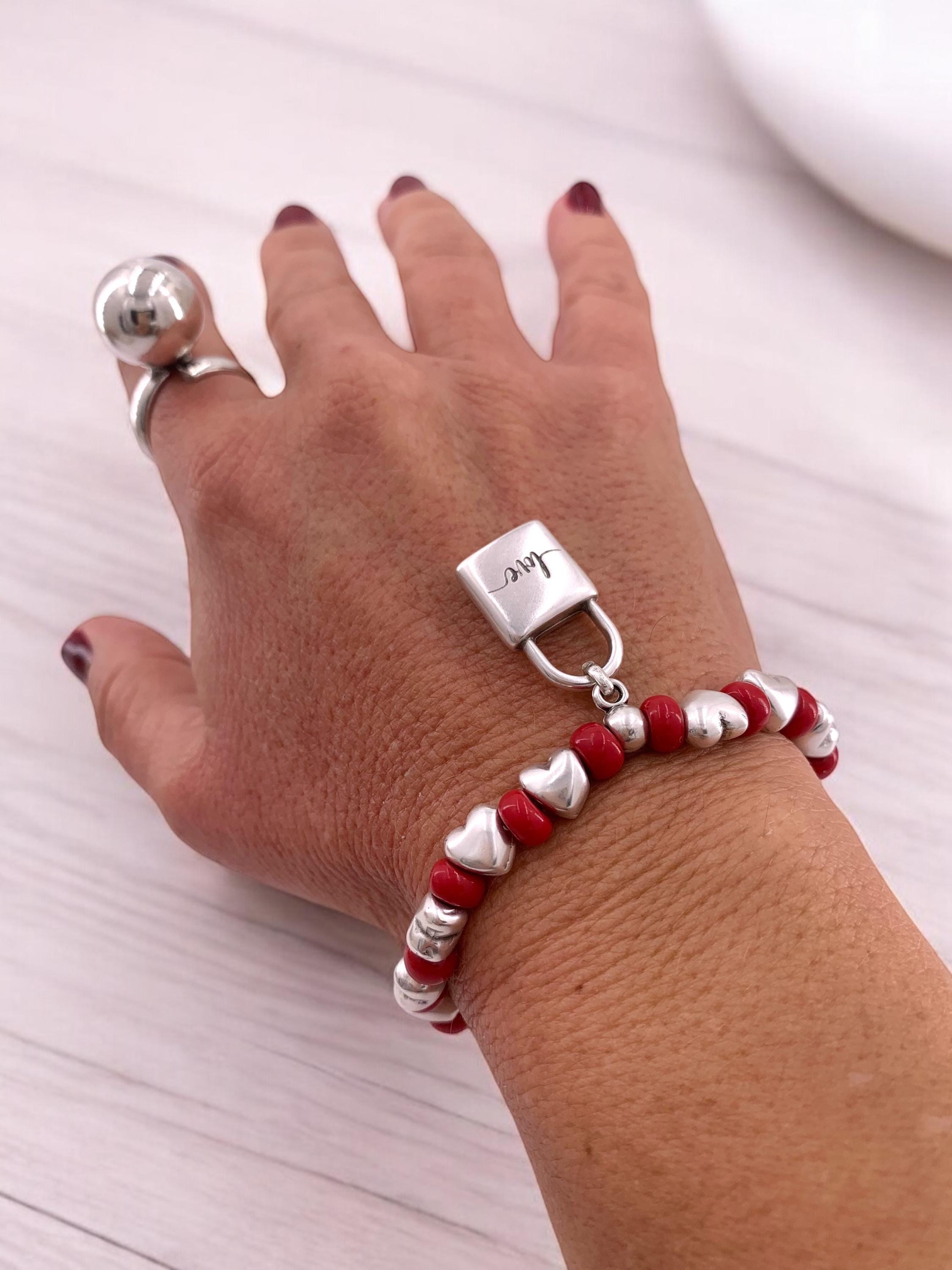 Chunky silver and crystal beads elastic bracelet with padlock pendant
