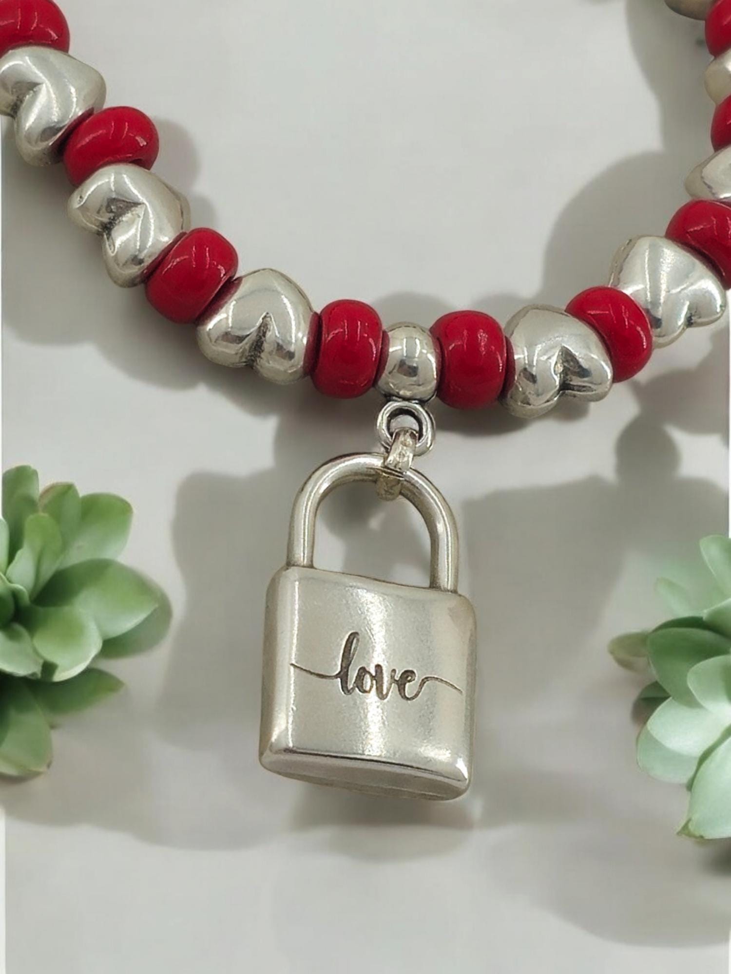 Chunky silver and crystal beads elastic bracelet with padlock pendant