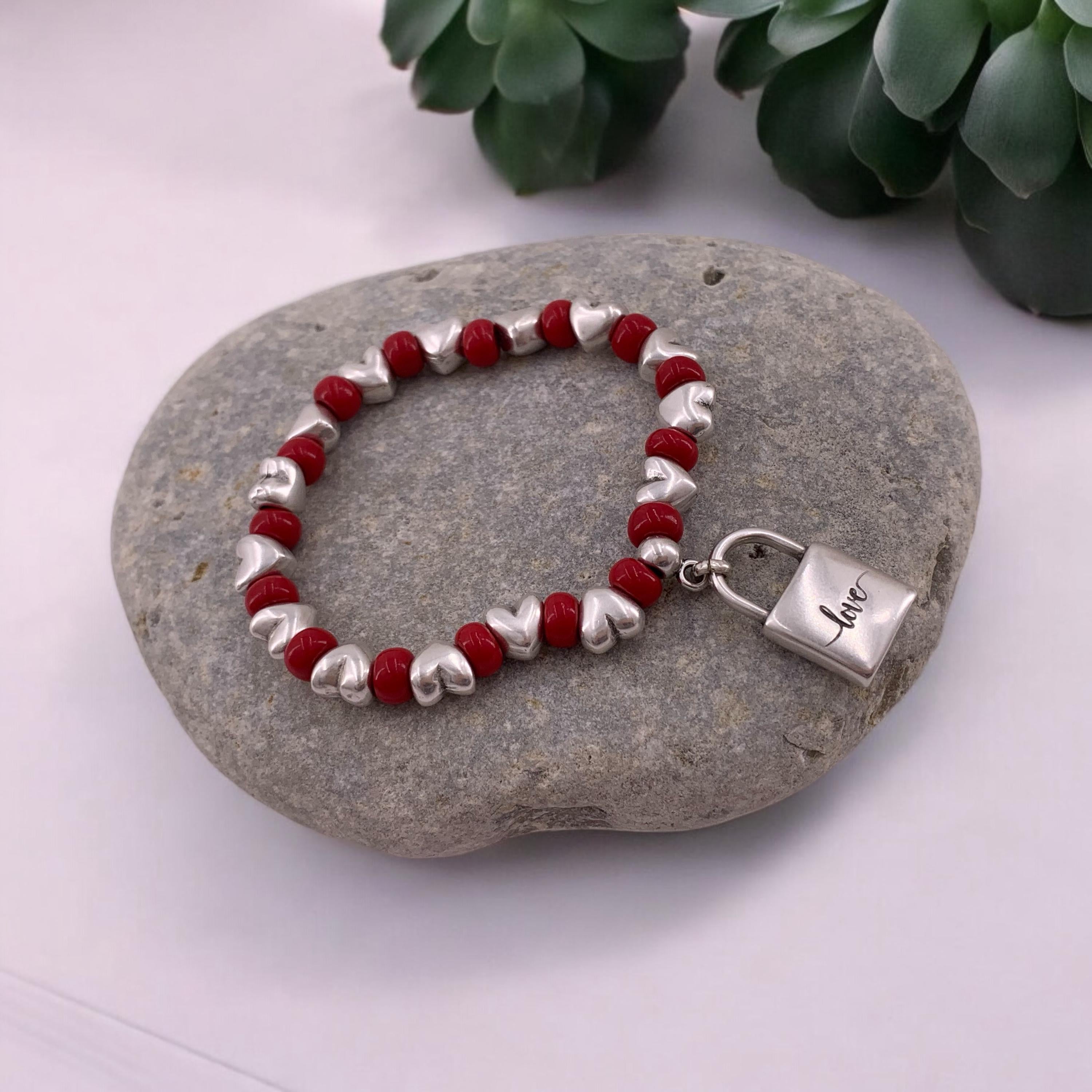 Chunky silver and crystal beads elastic bracelet with padlock pendant