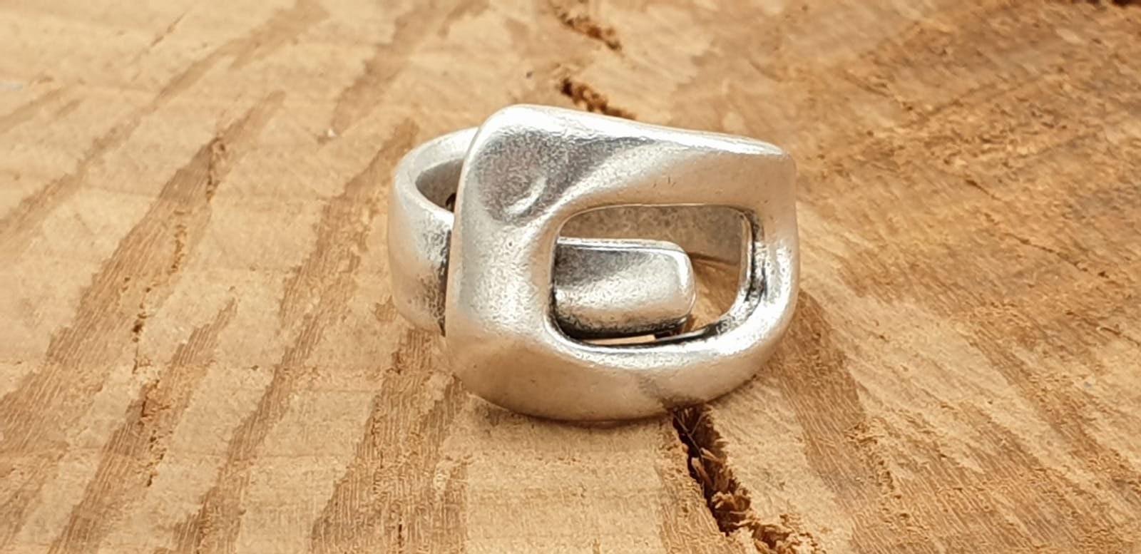 Bold, chunky, silver adjustable ring—perfect for birthdays. statement jewelry, a stylish silver gift for a friend or mom. on trend