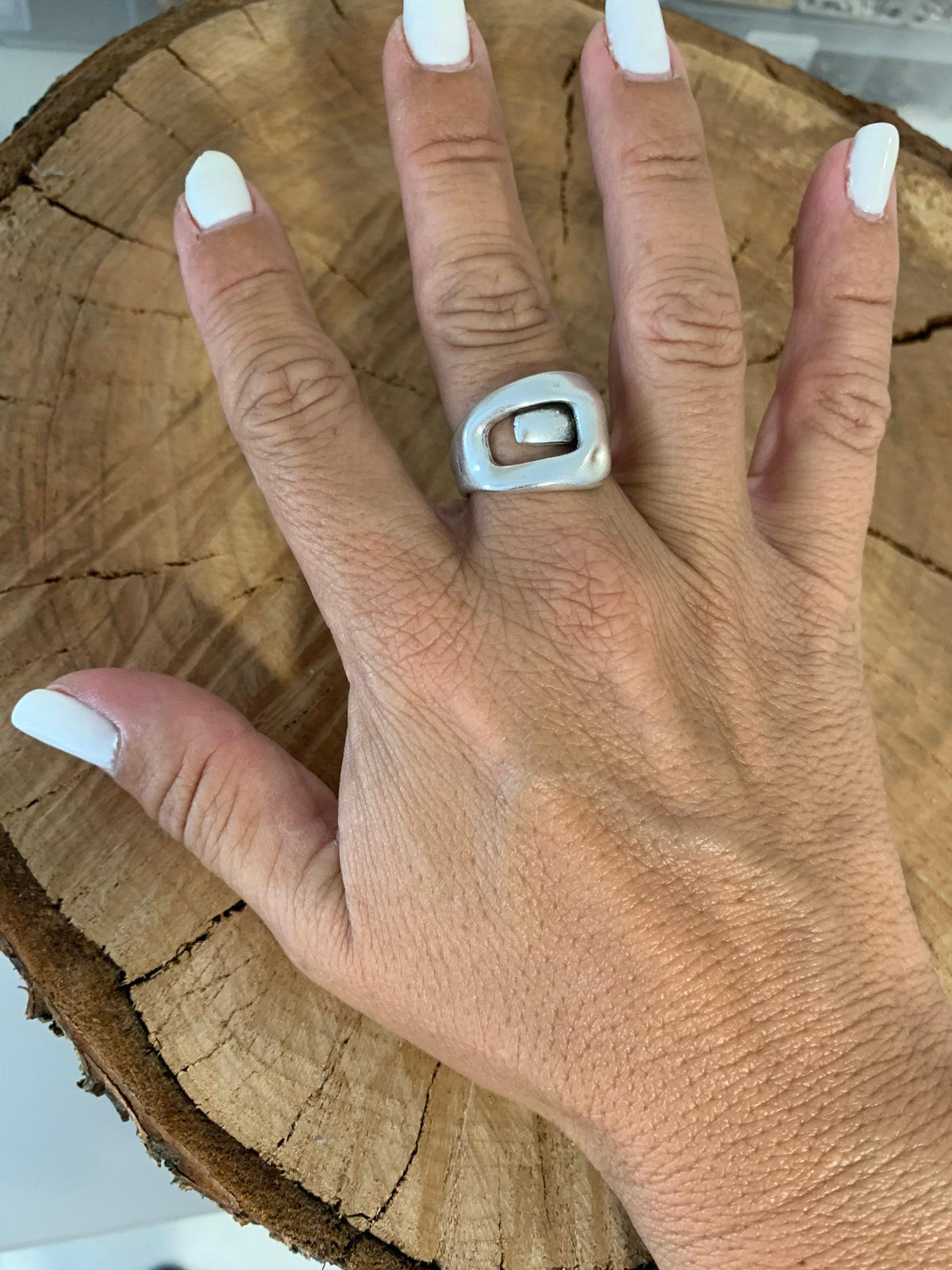 Bold, chunky, silver adjustable ring—perfect for birthdays. statement jewelry, a stylish silver gift for a friend or mom. on trend