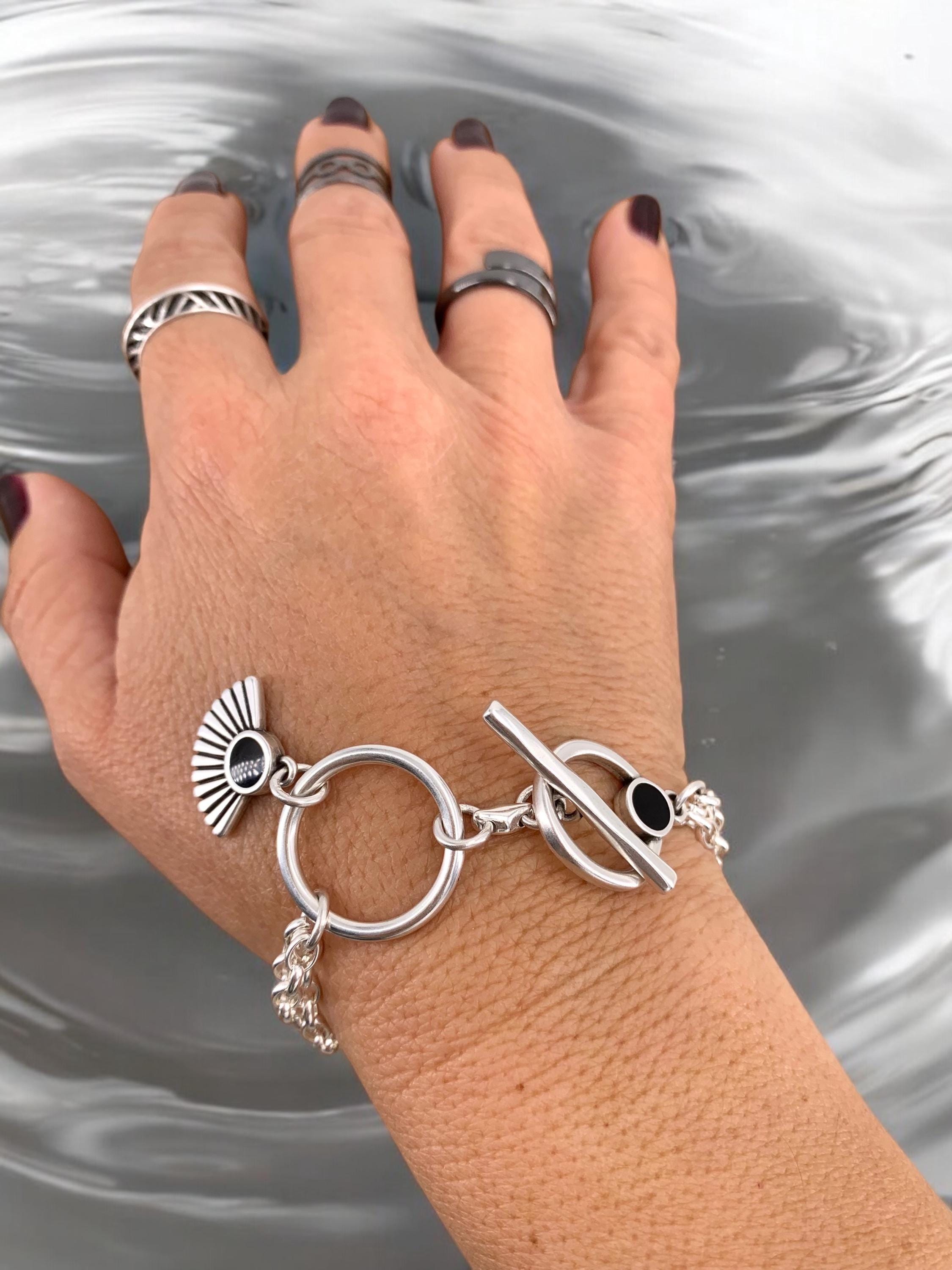 Multi strand silver chain bracelet with toggle clasp and tribal charms, custom handmade jewelry