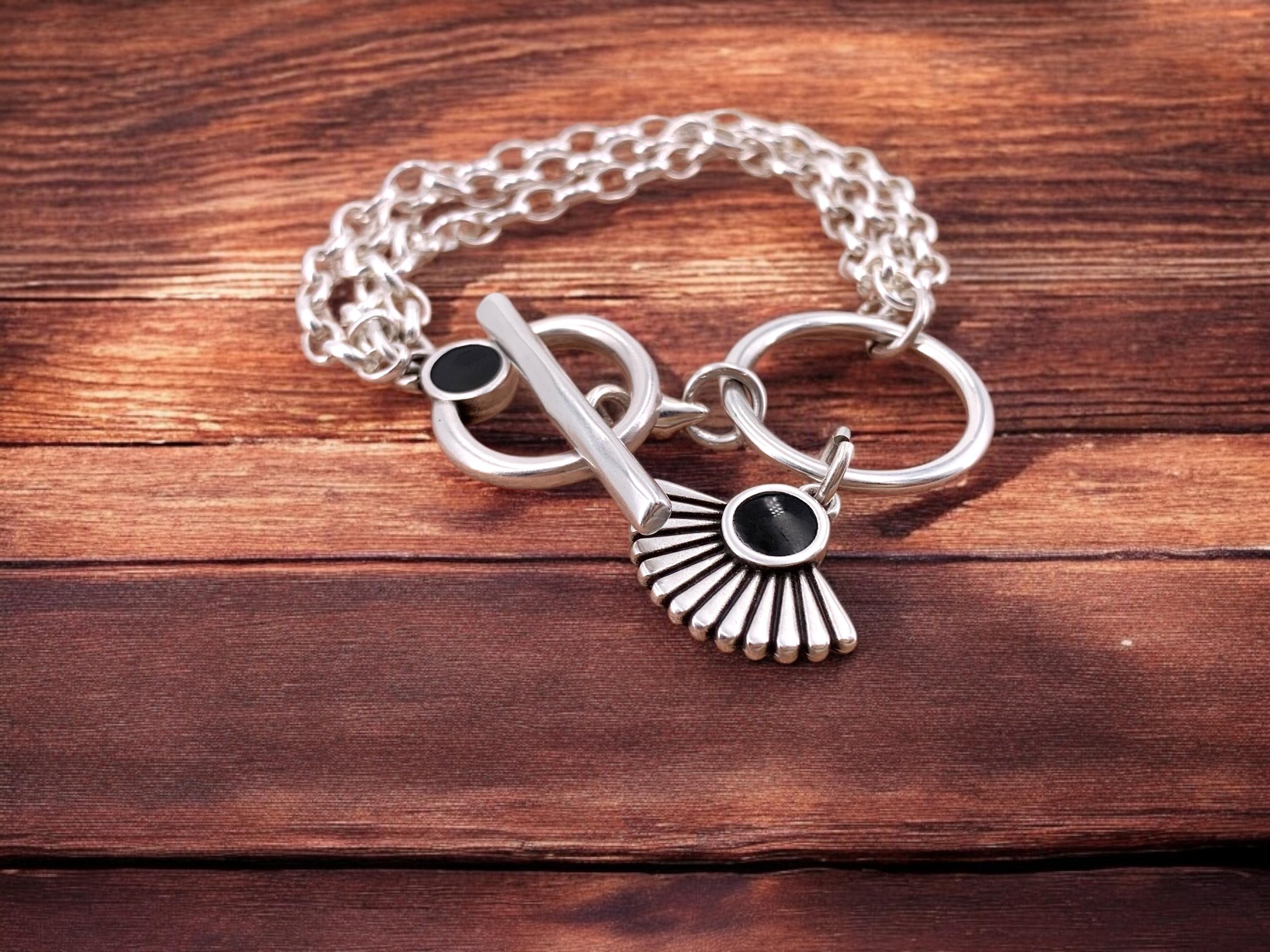 Multi strand silver chain bracelet with toggle clasp and tribal charms, custom handmade jewelry