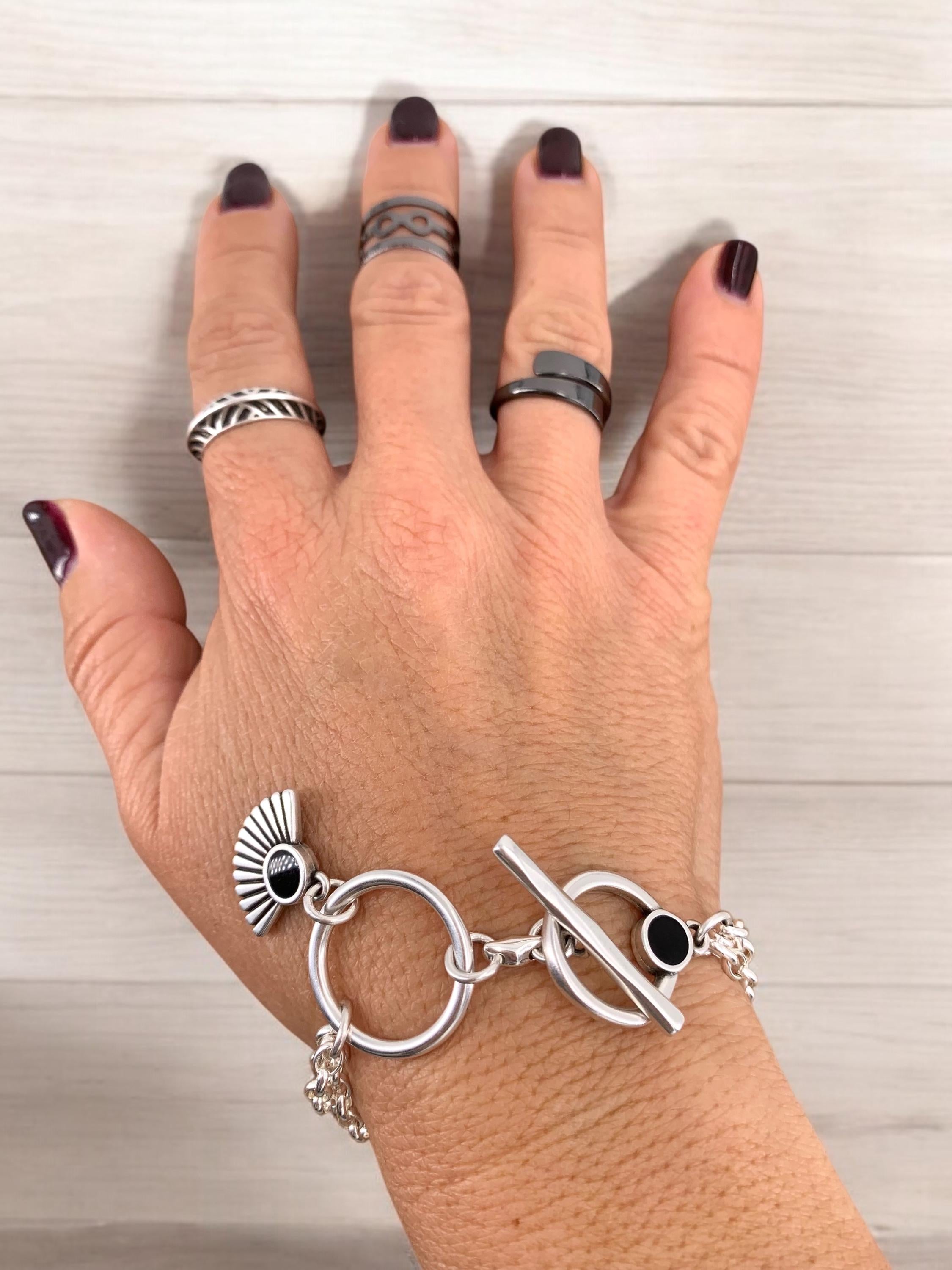 Multi strand silver chain bracelet with toggle clasp and tribal charms, custom handmade jewelry