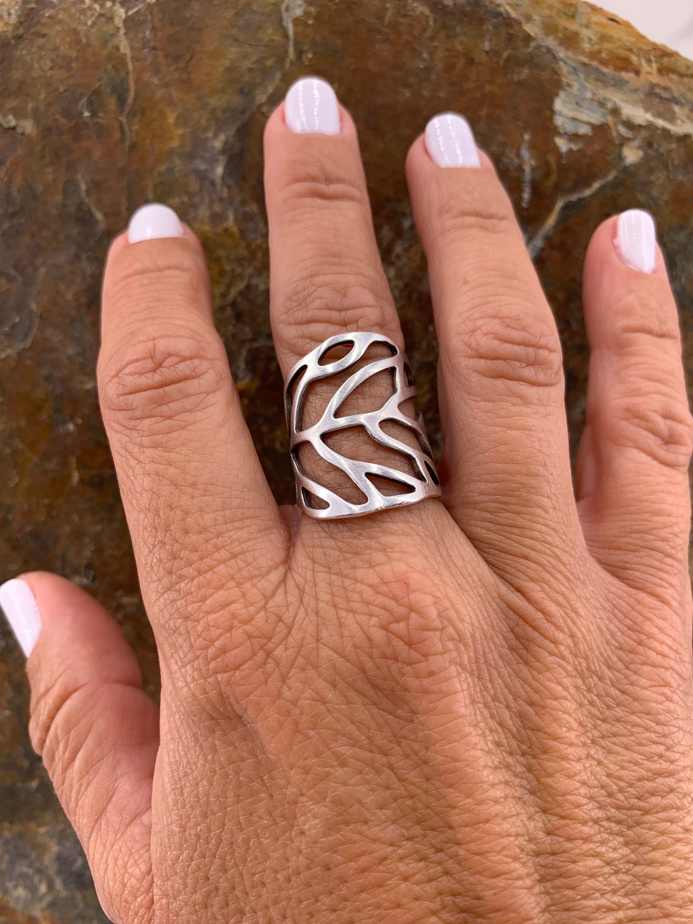 Wide silver or gold ring in the shape of a carved leaf, ideal for elevating any outfit, perfect gift for a stylish woman, chunky silver ring