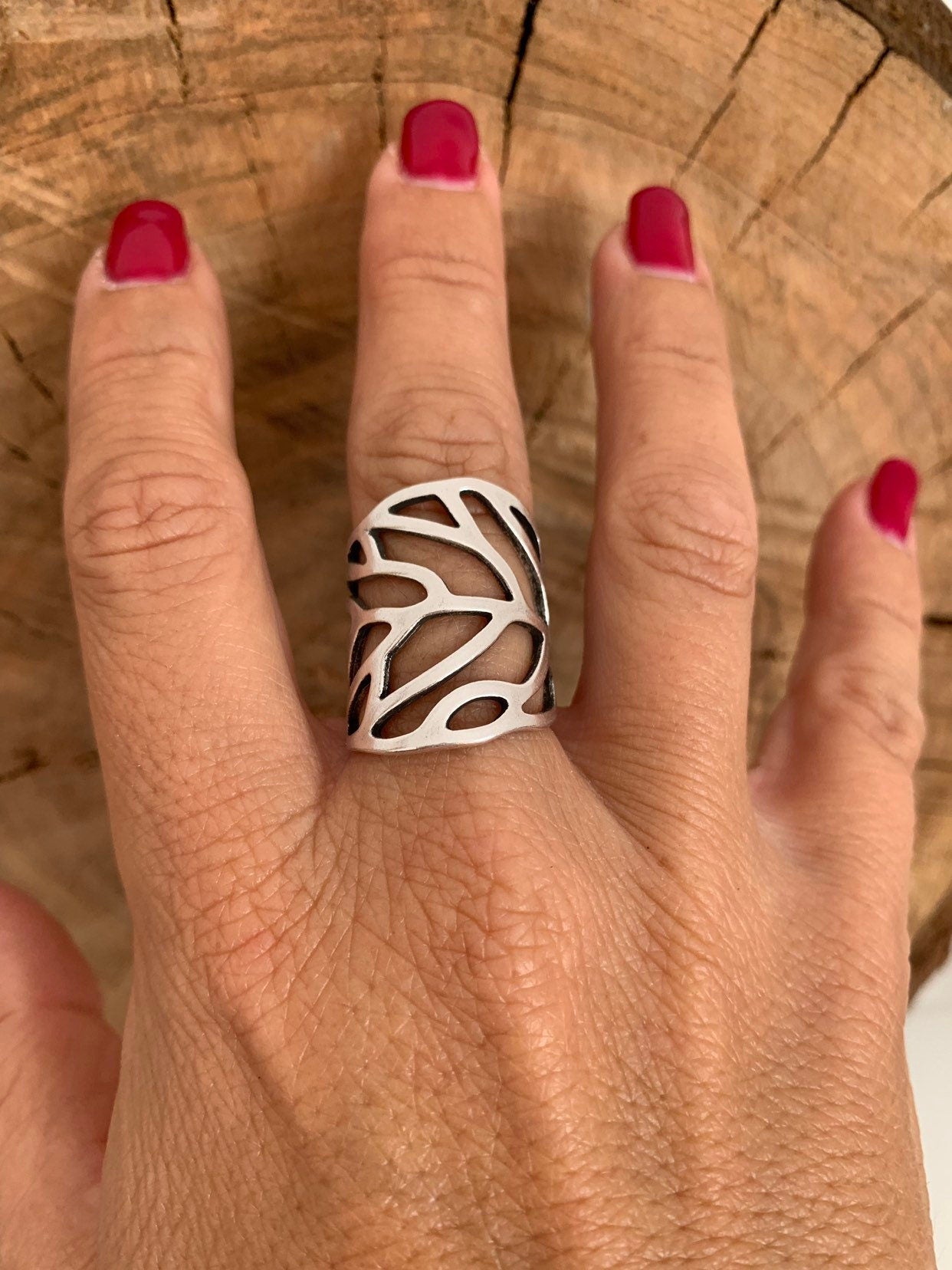 Wide silver or gold ring in the shape of a carved leaf, ideal for elevating any outfit, perfect gift for a stylish woman, chunky silver ring