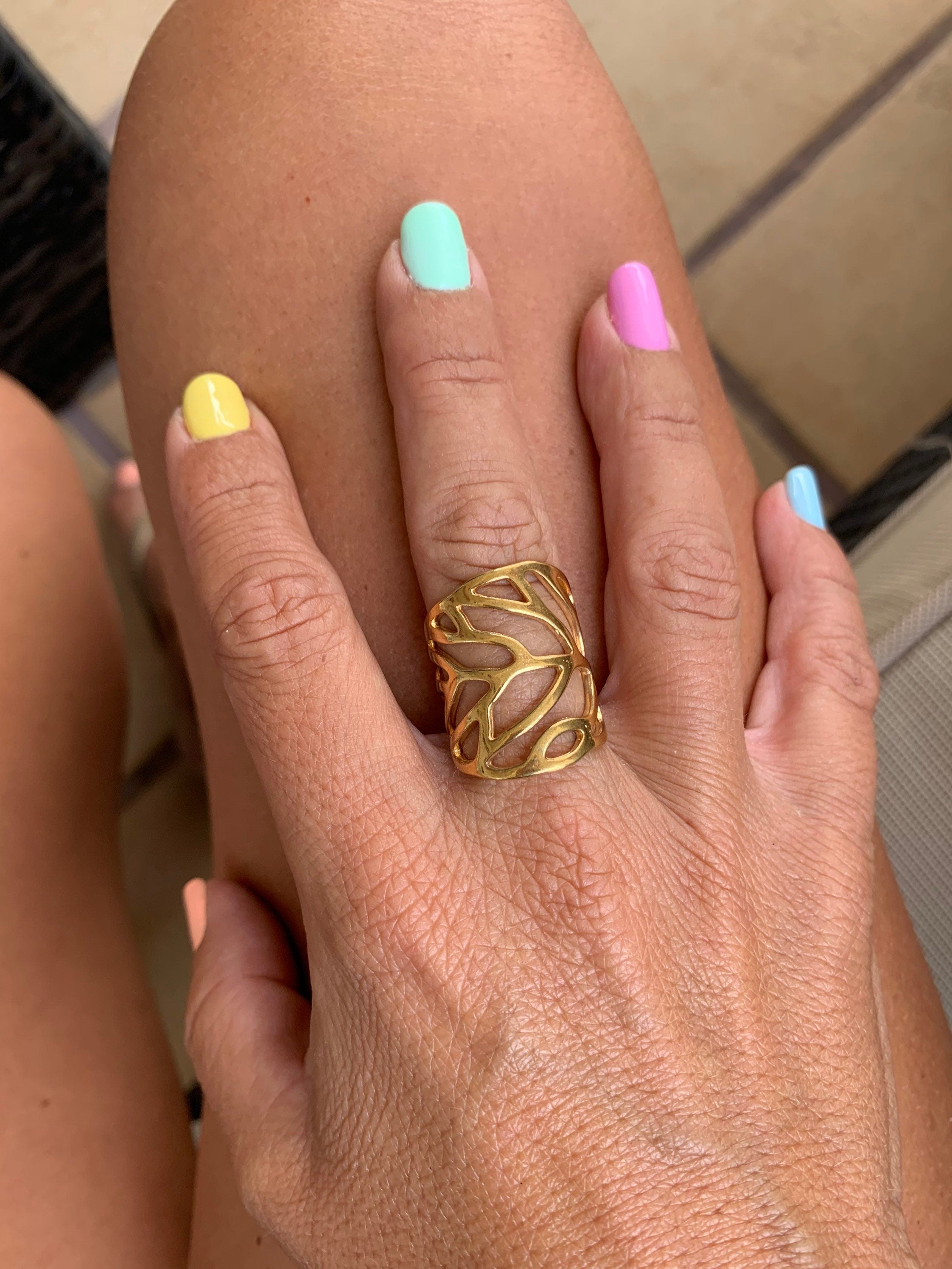 Wide silver or gold ring in the shape of a carved leaf, ideal for elevating any outfit, perfect gift for a stylish woman, chunky silver ring
