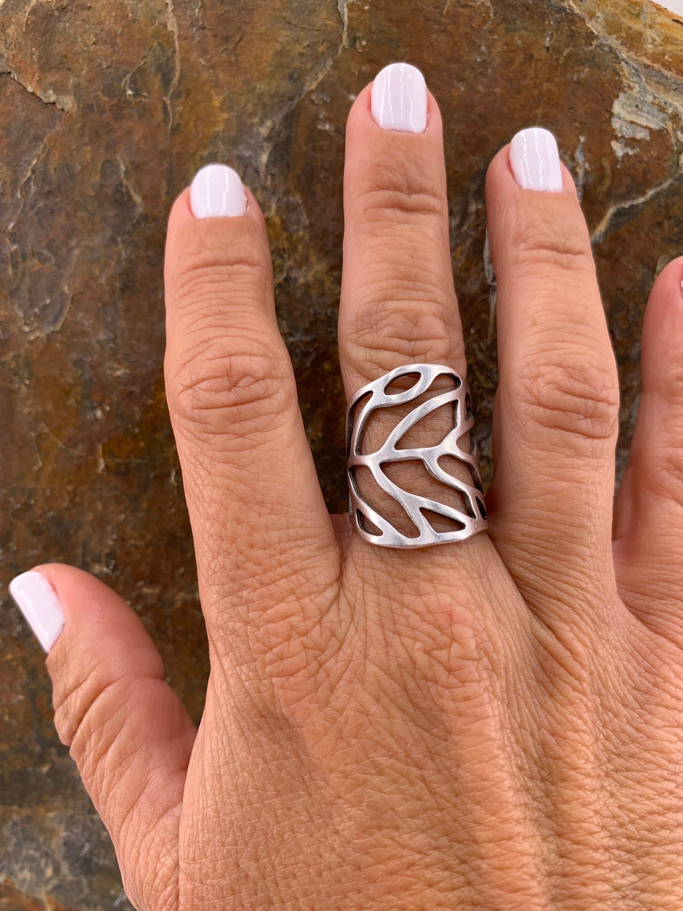 Wide silver or gold ring in the shape of a carved leaf, ideal for elevating any outfit, perfect gift for a stylish woman, chunky silver ring