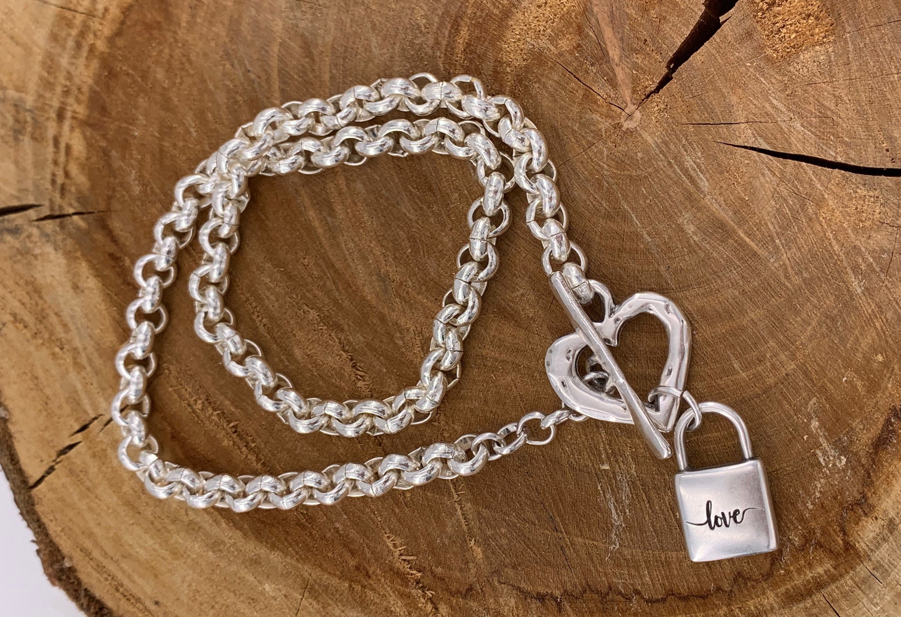 Thick chain silver necklace with a heart-shaped toggle clasp and a padlock-shaped pendant, uno de 50 style silver chunky necklace,