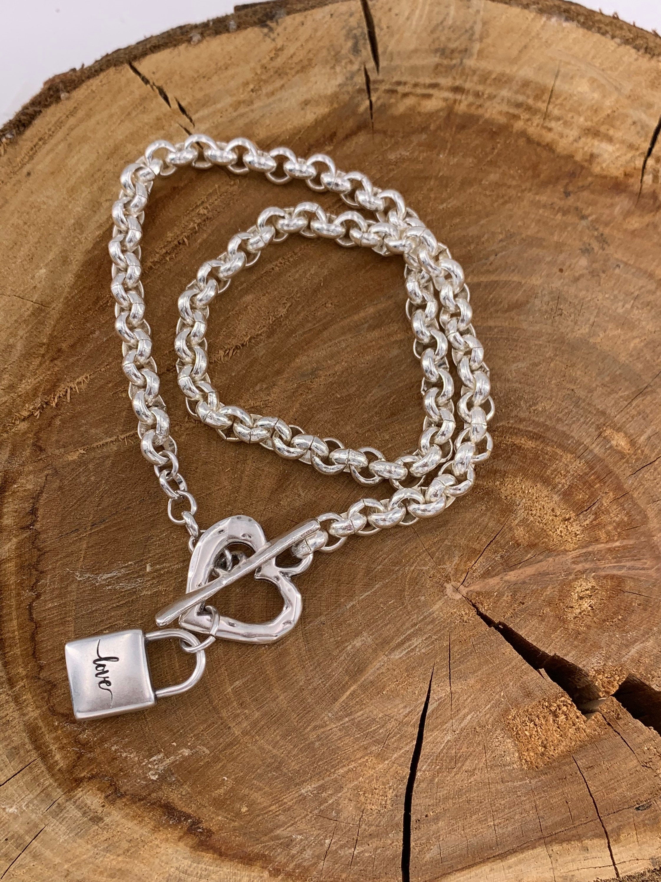 Thick chain silver necklace with a heart-shaped toggle clasp and a padlock-shaped pendant, uno de 50 style silver chunky necklace,
