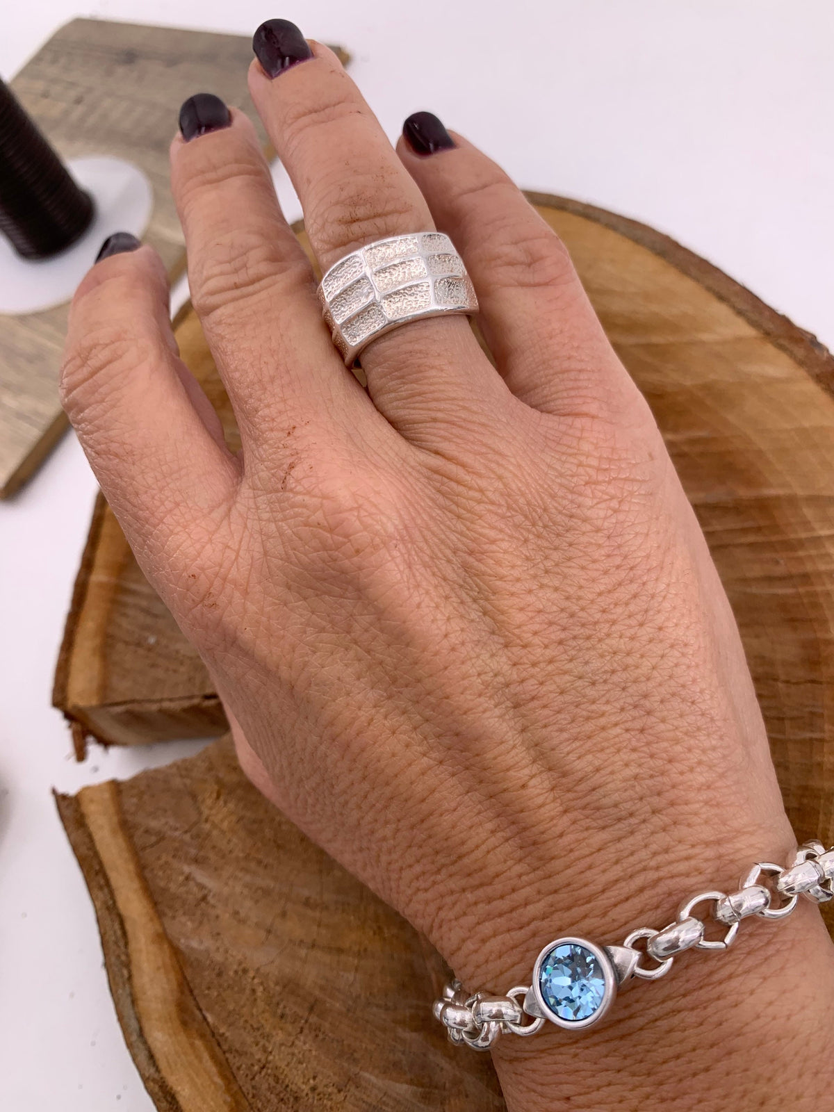 chunky silver chain bracelet with Swarovsky Crystal central piece, custom bold jewelry