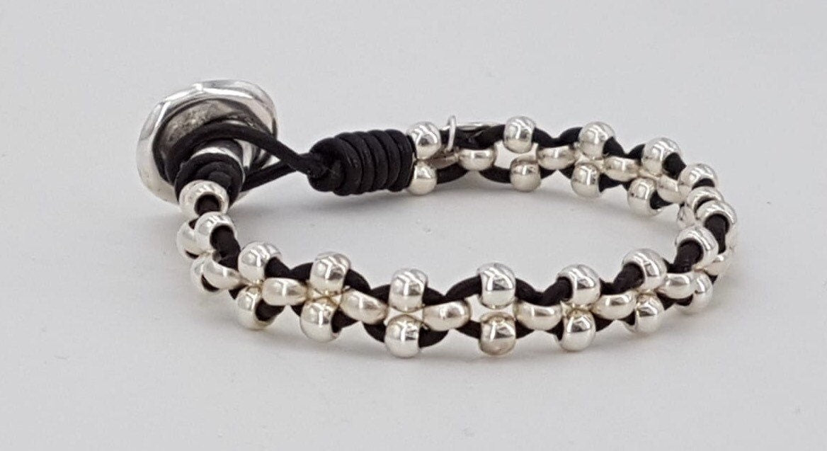 Artisan Bohemian silver leather braided beaded bracelet, tribal hippie handmade jewelry.