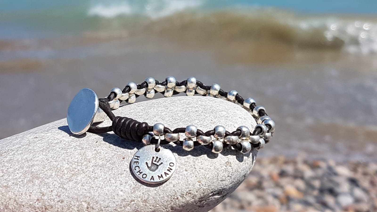 Artisan Bohemian silver leather braided beaded bracelet, tribal hippie handmade jewelry.