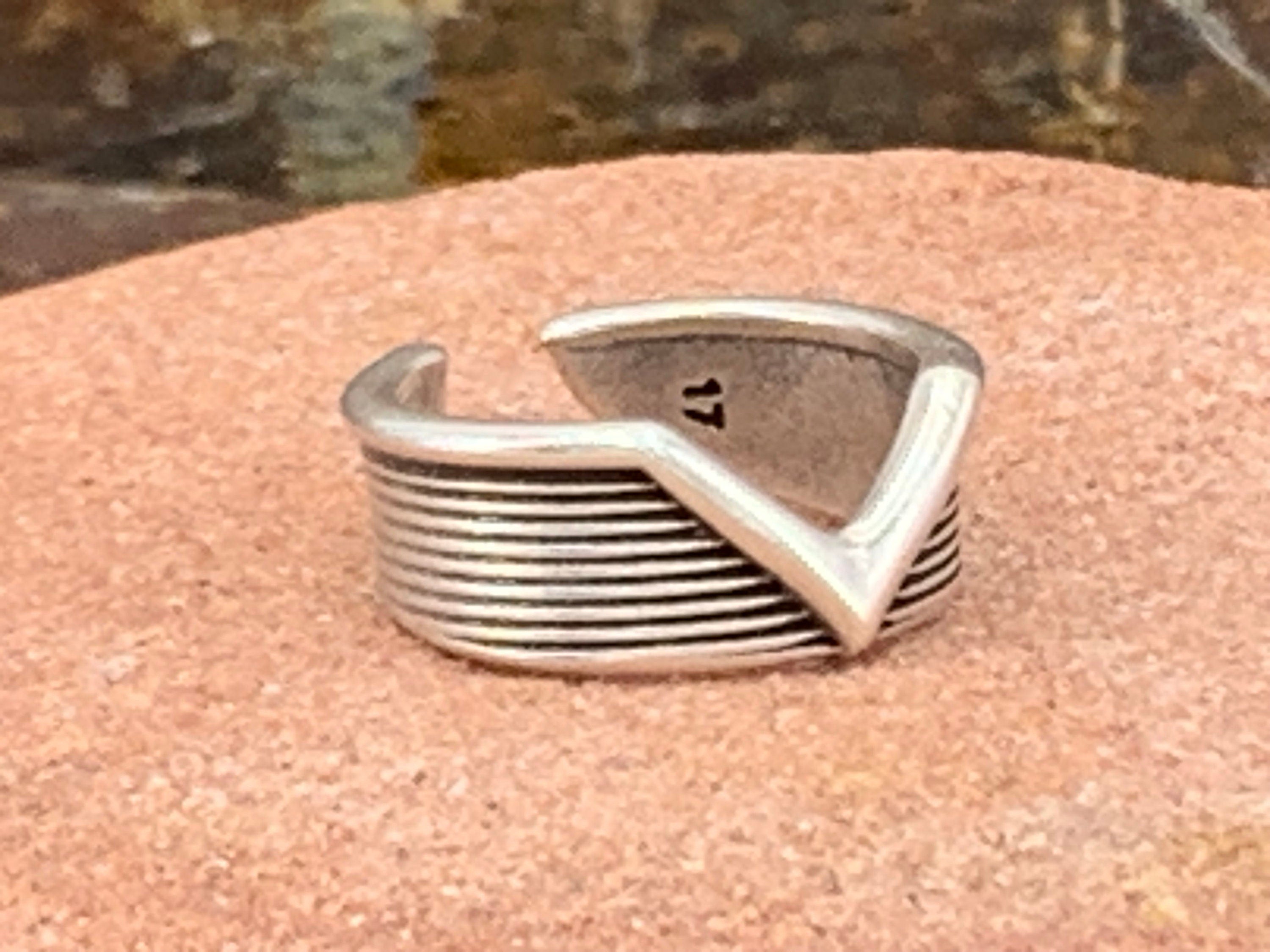 Silver unisex rock-style chunky ring engraved and open band