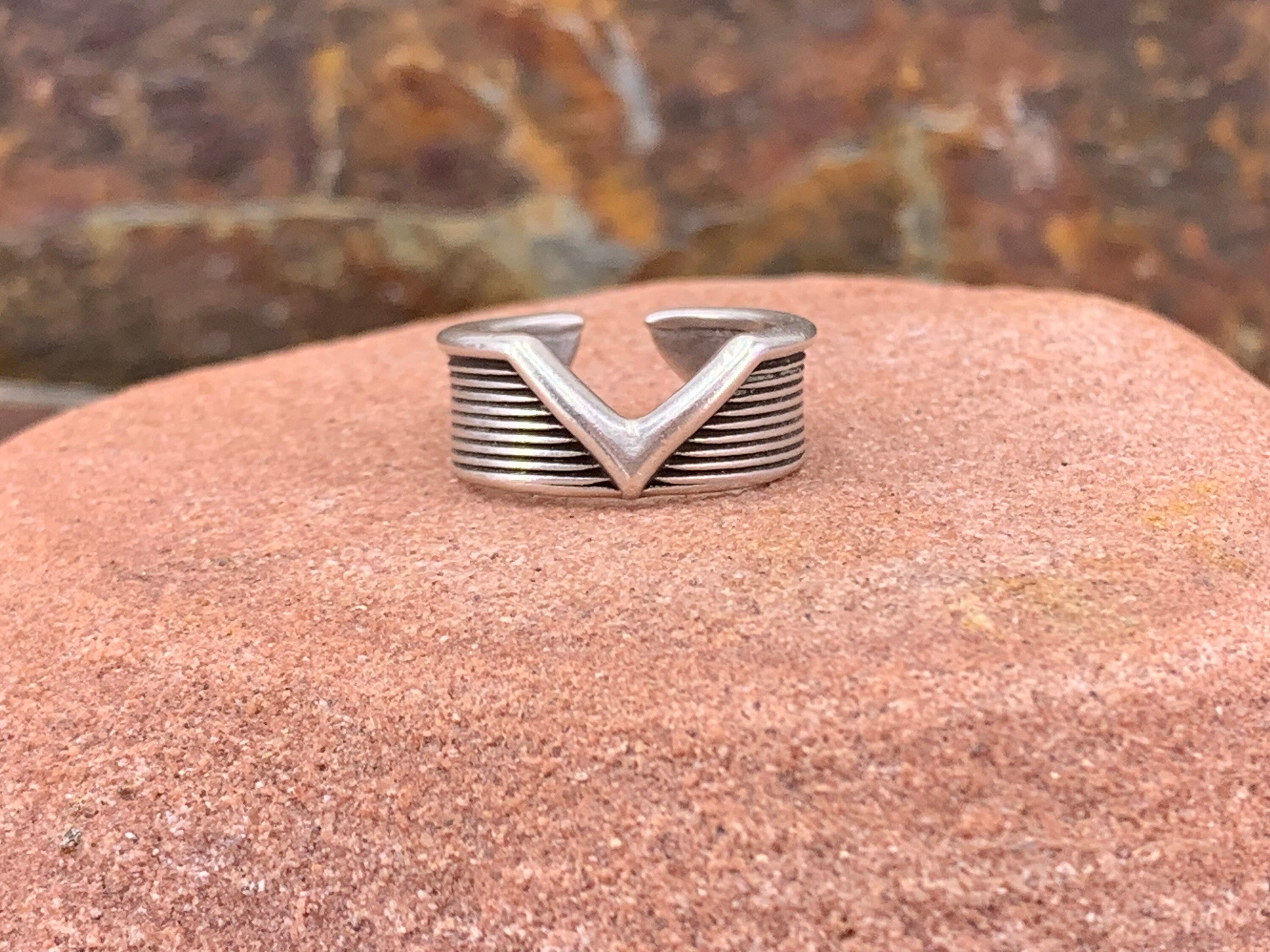 Silver unisex rock-style chunky ring engraved and open band