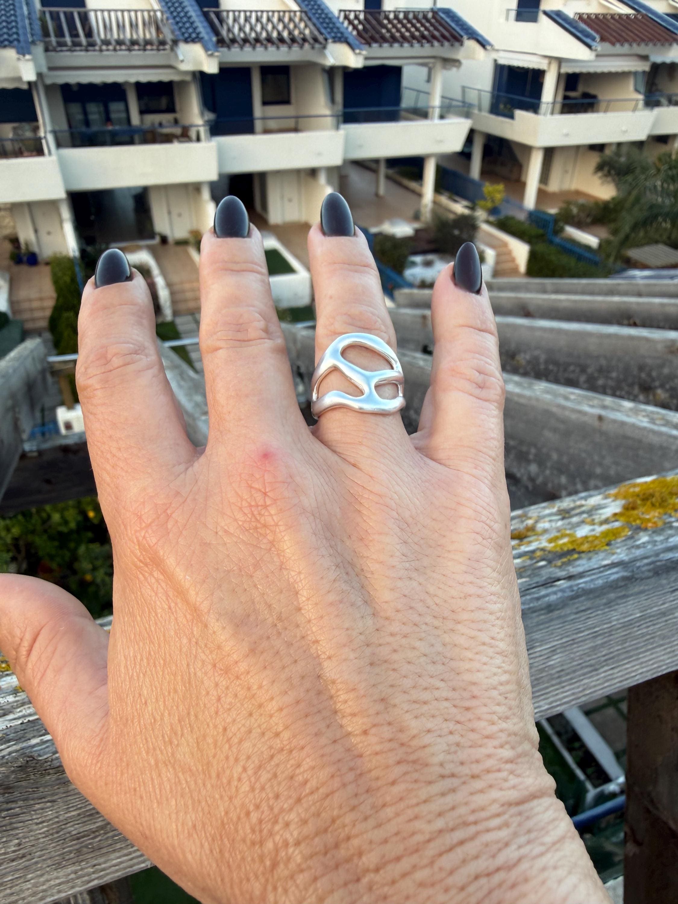 Artisian silver plated carved ring with open band design and bohemian style